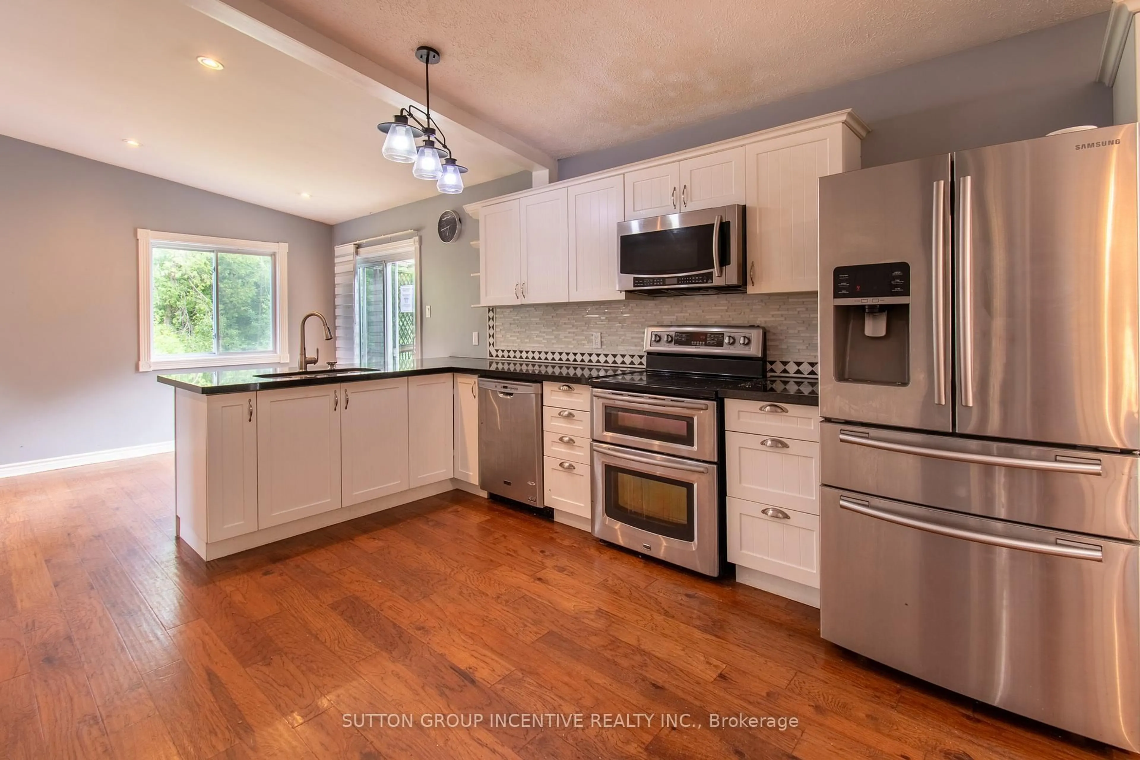 Open concept kitchen, unknown for 59 Forest Hill Dr, Adjala-Tosorontio Ontario L0M 1J0