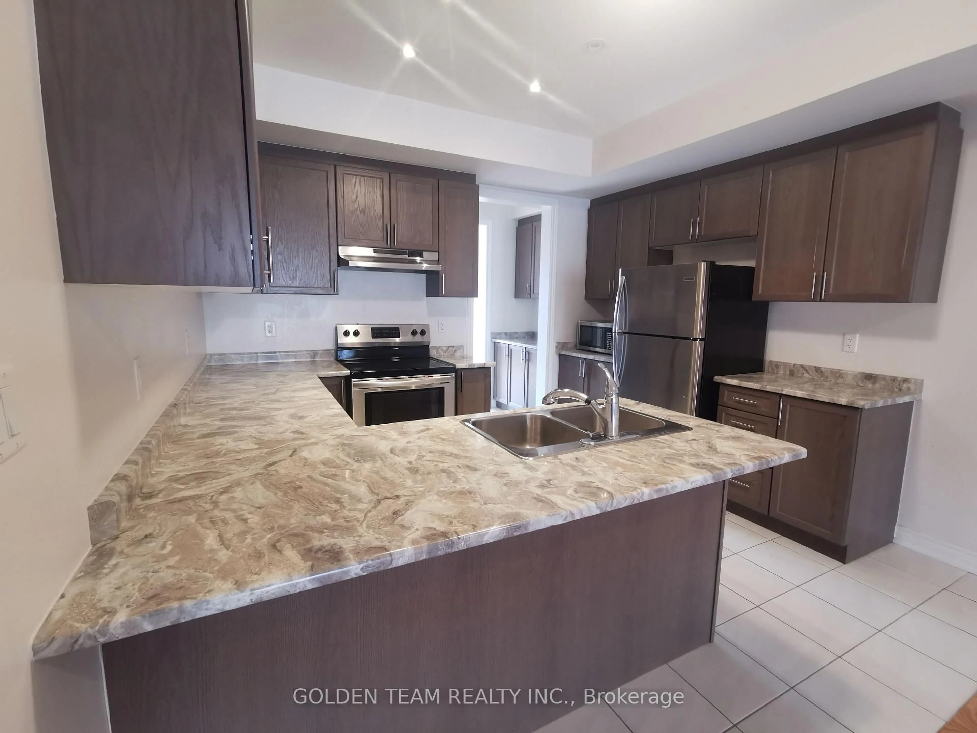 Open concept kitchen, ceramic/tile floor for 41 Luzon Ave, Markham Ontario L6B 1N7