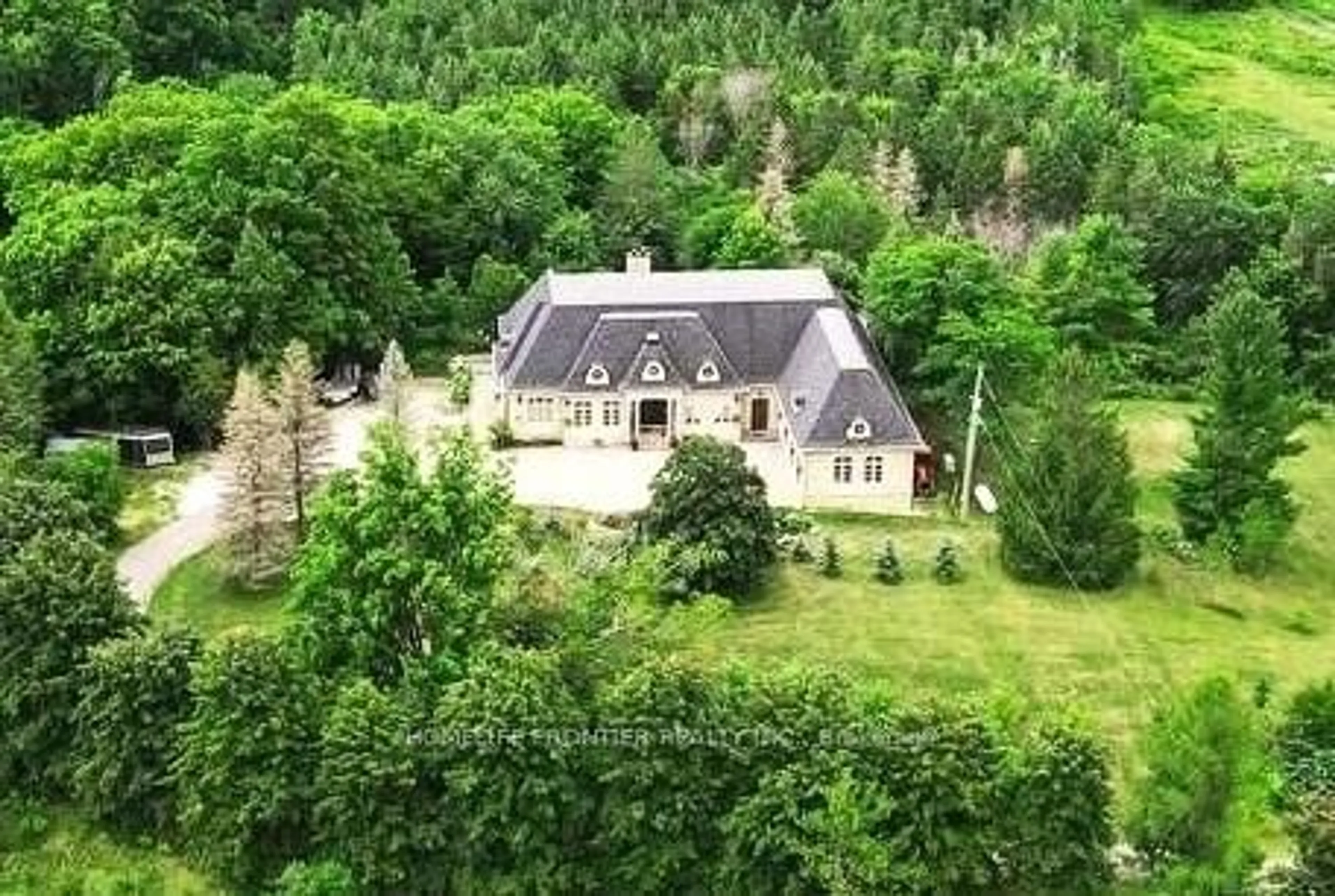 A pic from outside/outdoor area/front of a property/back of a property/a pic from drone, forest/trees view for 7645 16th Sdrd, King Ontario L7E 5R7