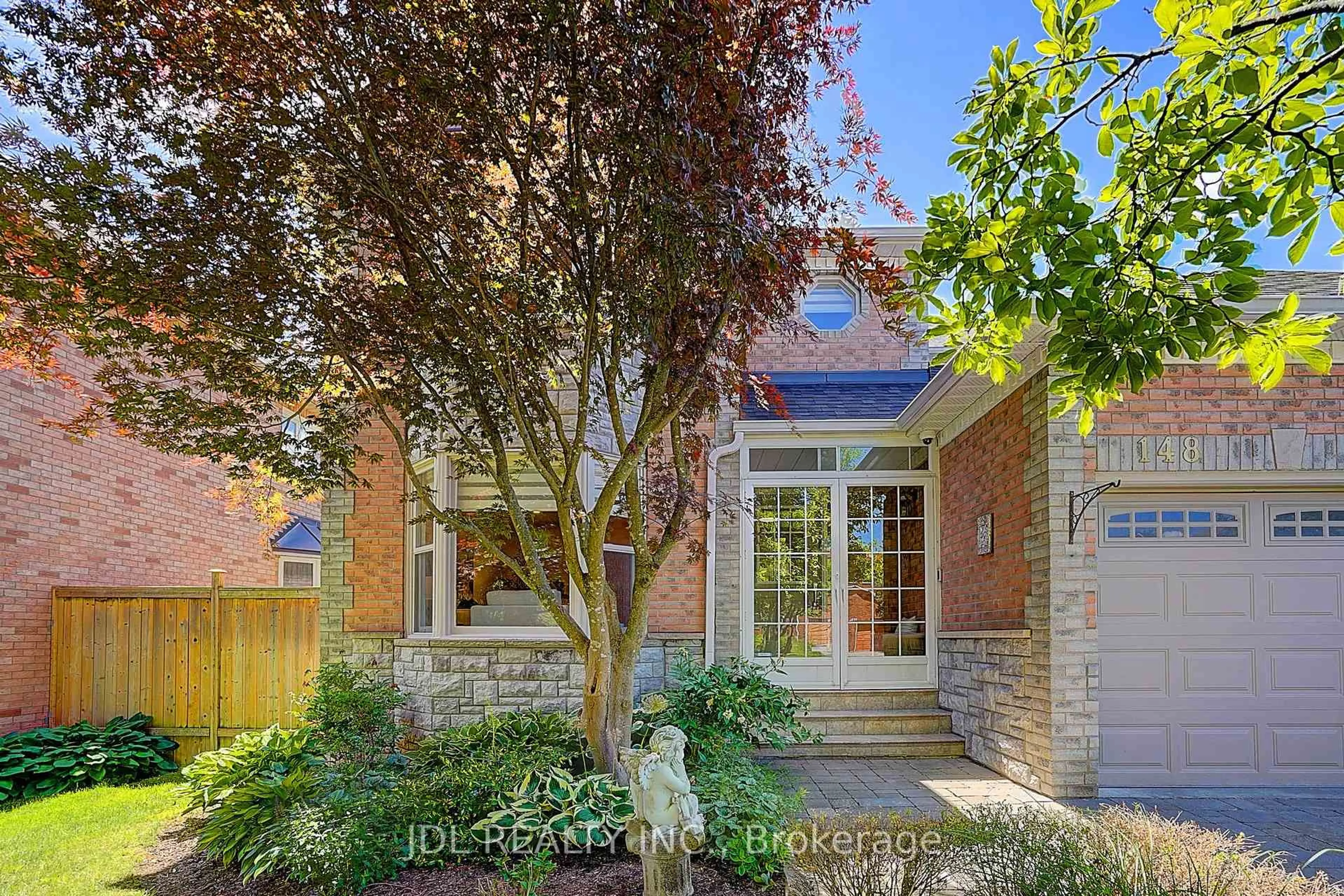 Home with brick exterior material, street for 148 Manhattan Dr, Markham Ontario L3P 7S1
