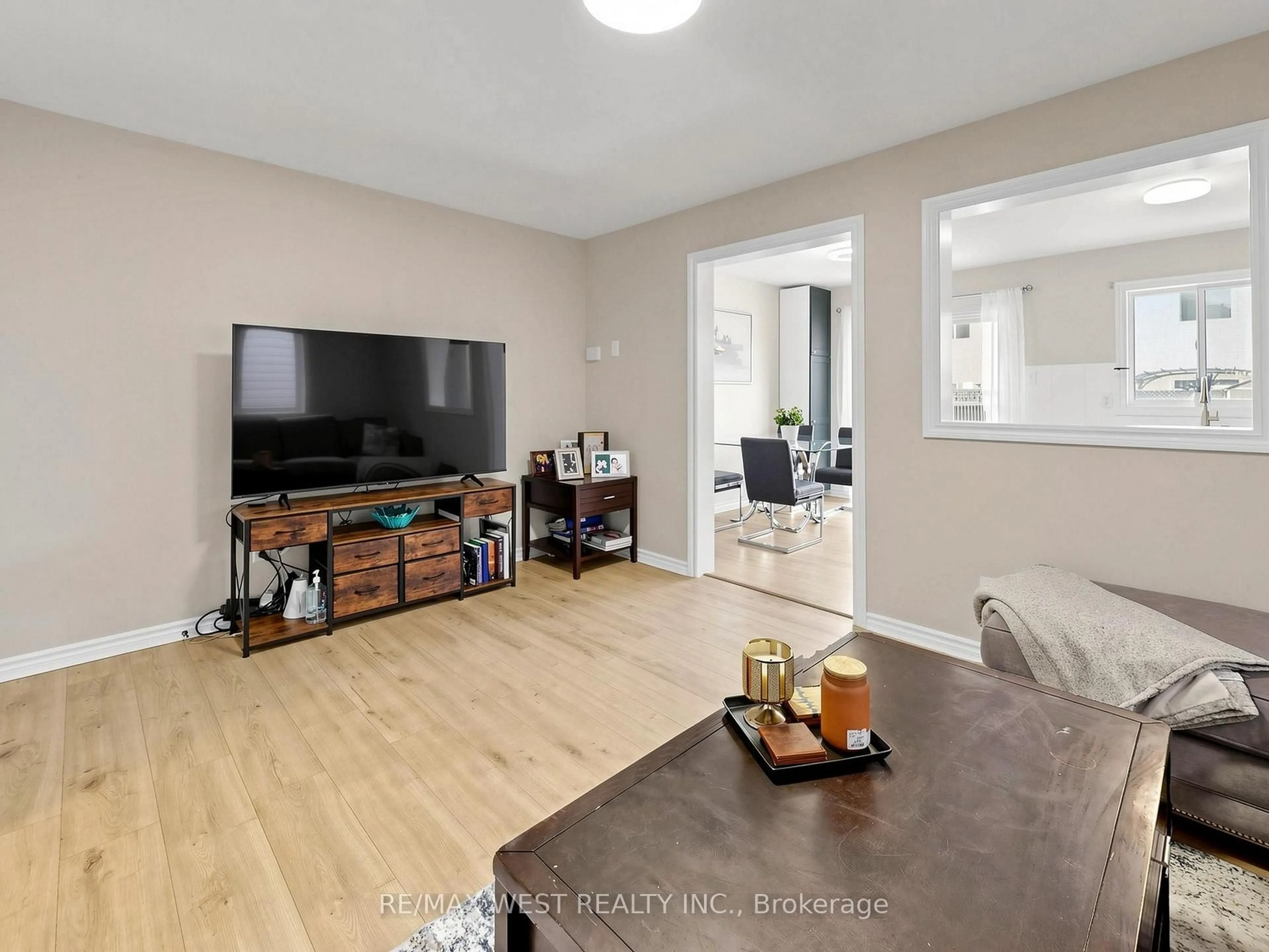 Living room with furniture, unknown for 195 Banting Cres, Essa Ontario L0M 1B6