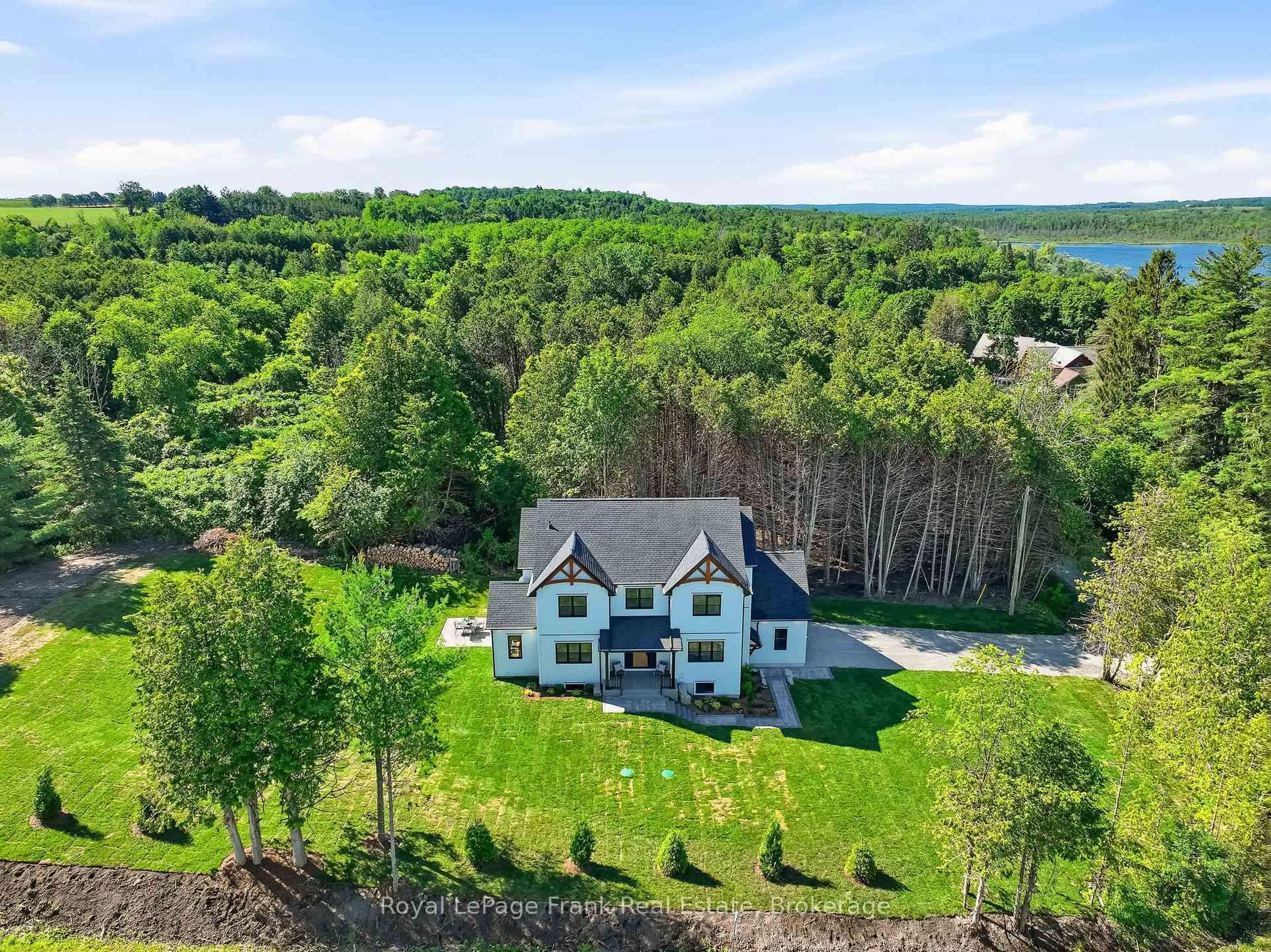 A pic from outside/outdoor area/front of a property/back of a property/a pic from drone, water/lake/river/ocean view for S11001 Acton Rd, Brock Ontario L0C 1H0