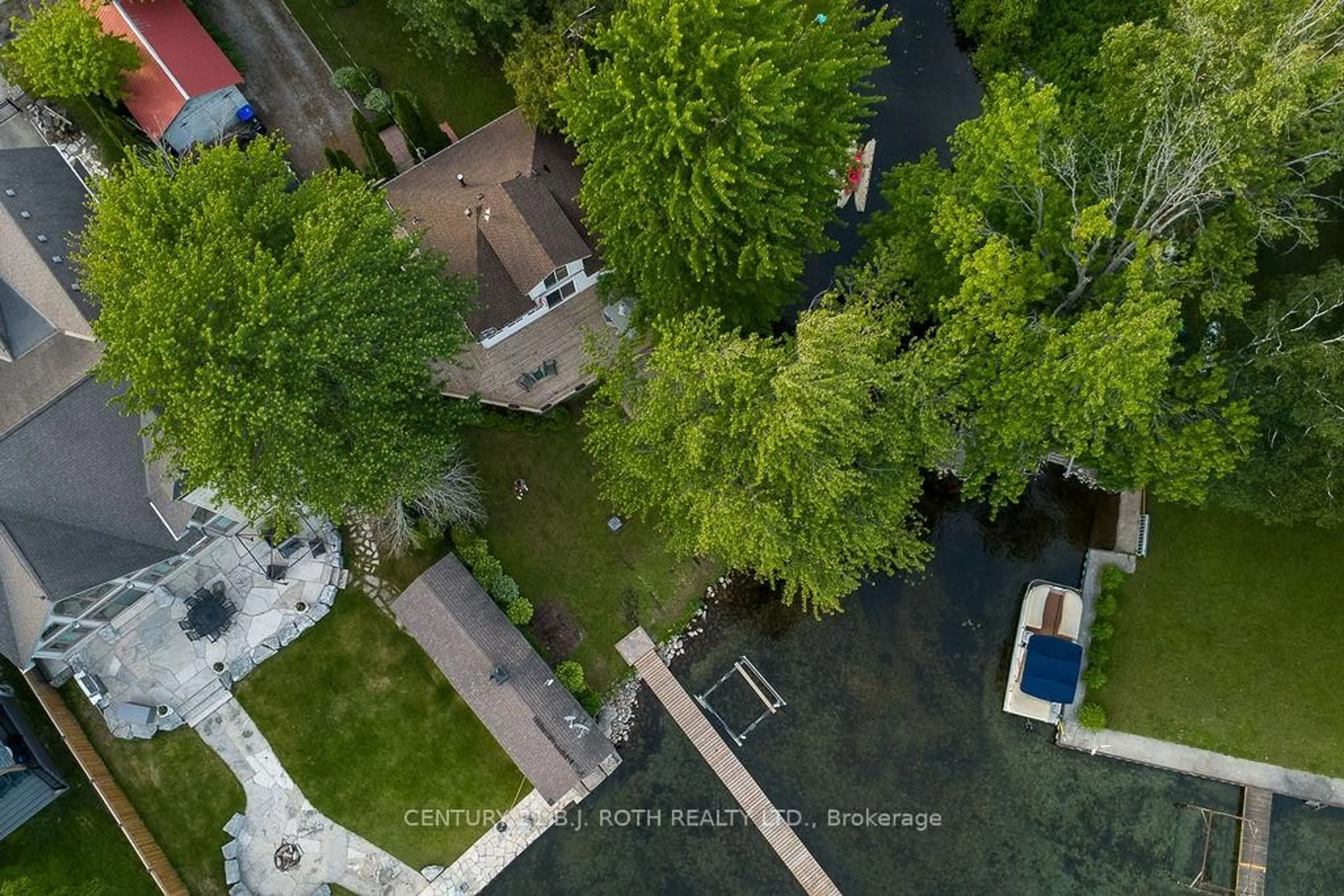 A pic from outside/outdoor area/front of a property/back of a property/a pic from drone, water/lake/river/ocean view for 2389 Crystal Beach Rd, Innisfil Ontario L9S 3W8