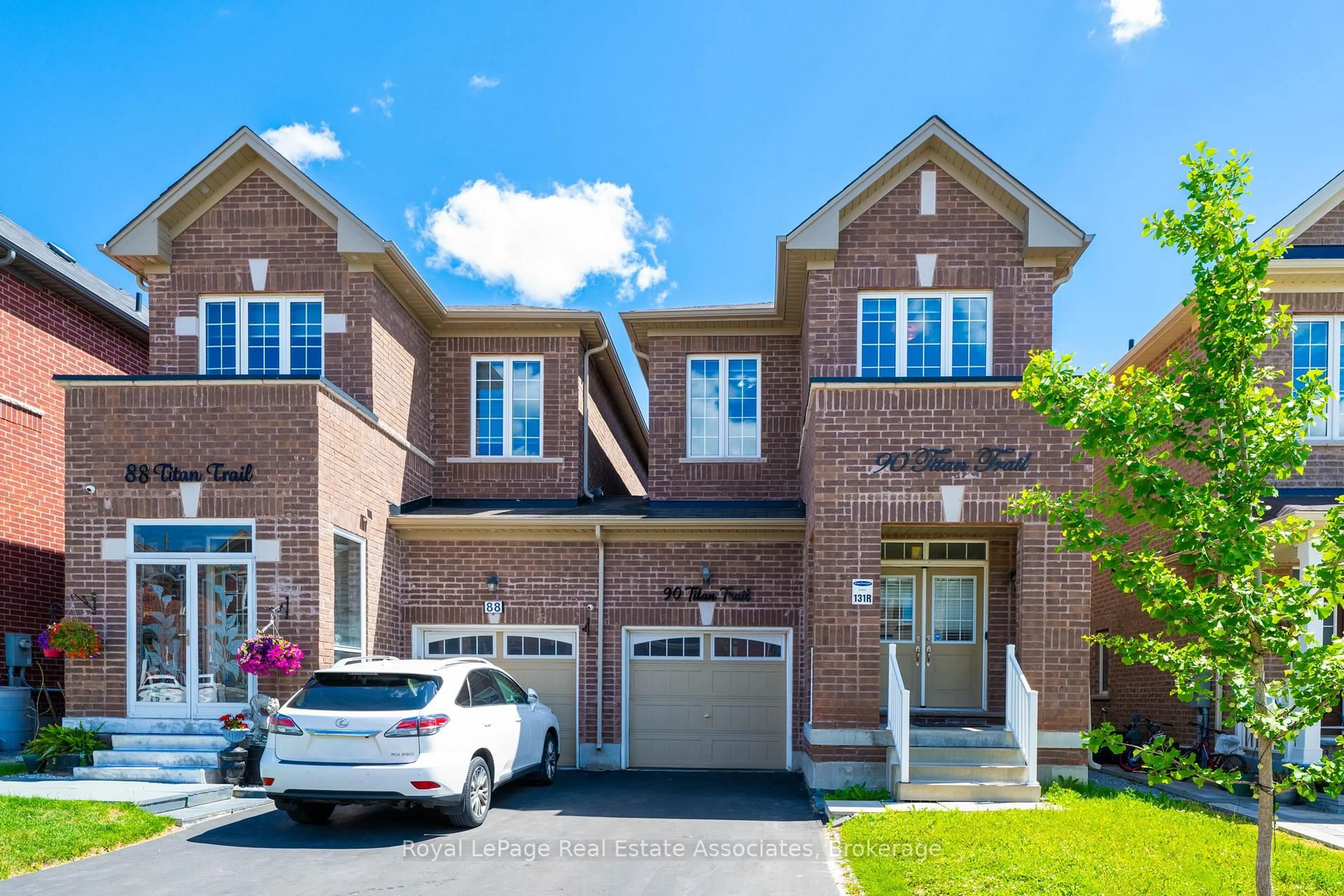 Home with brick exterior material, street for 90 Titan Tr, Markham Ontario L3S 0E2