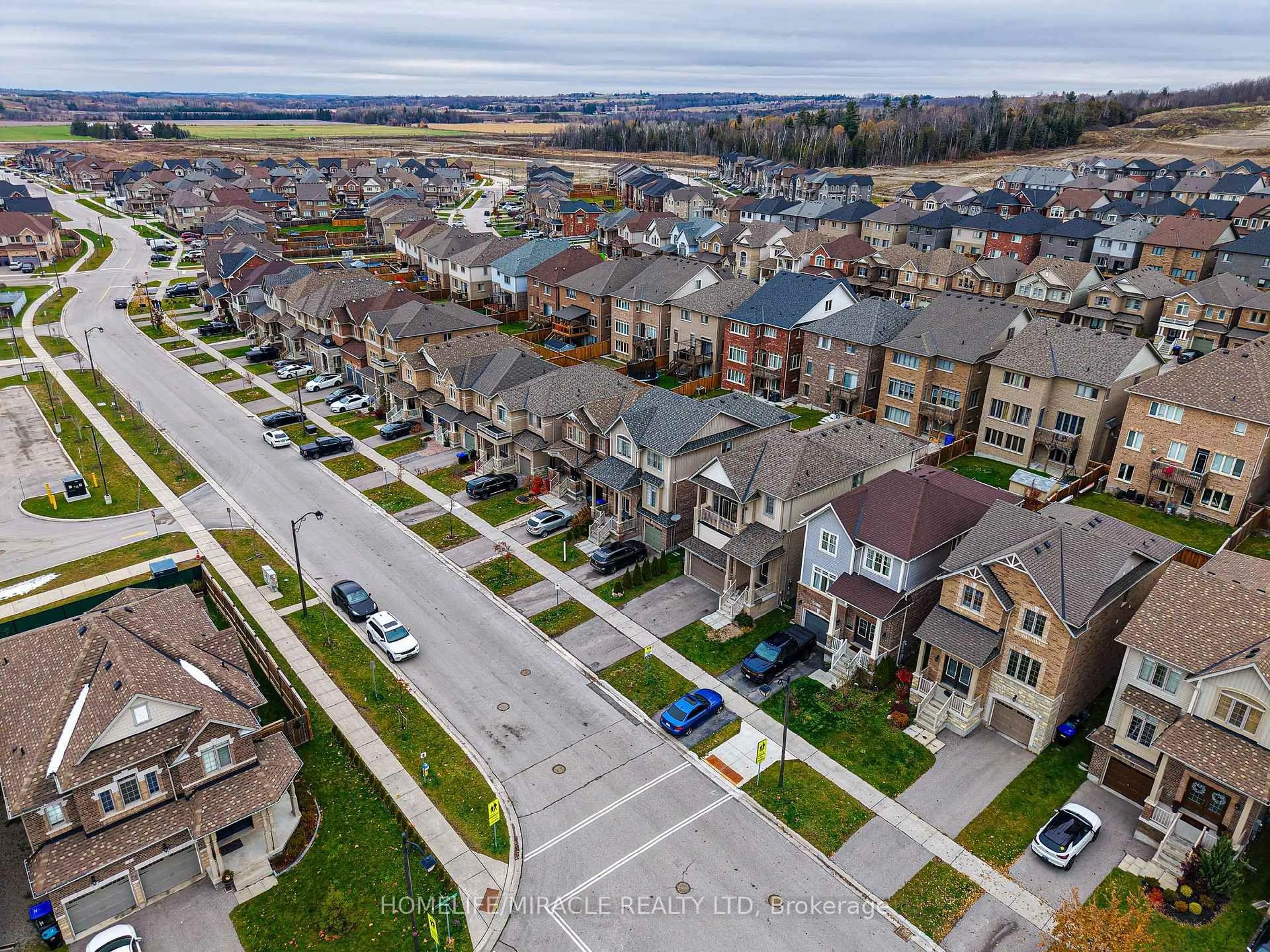 A pic from outside/outdoor area/front of a property/back of a property/a pic from drone, street for 79 Willoughby Way, New Tecumseth Ontario L9R 0P4