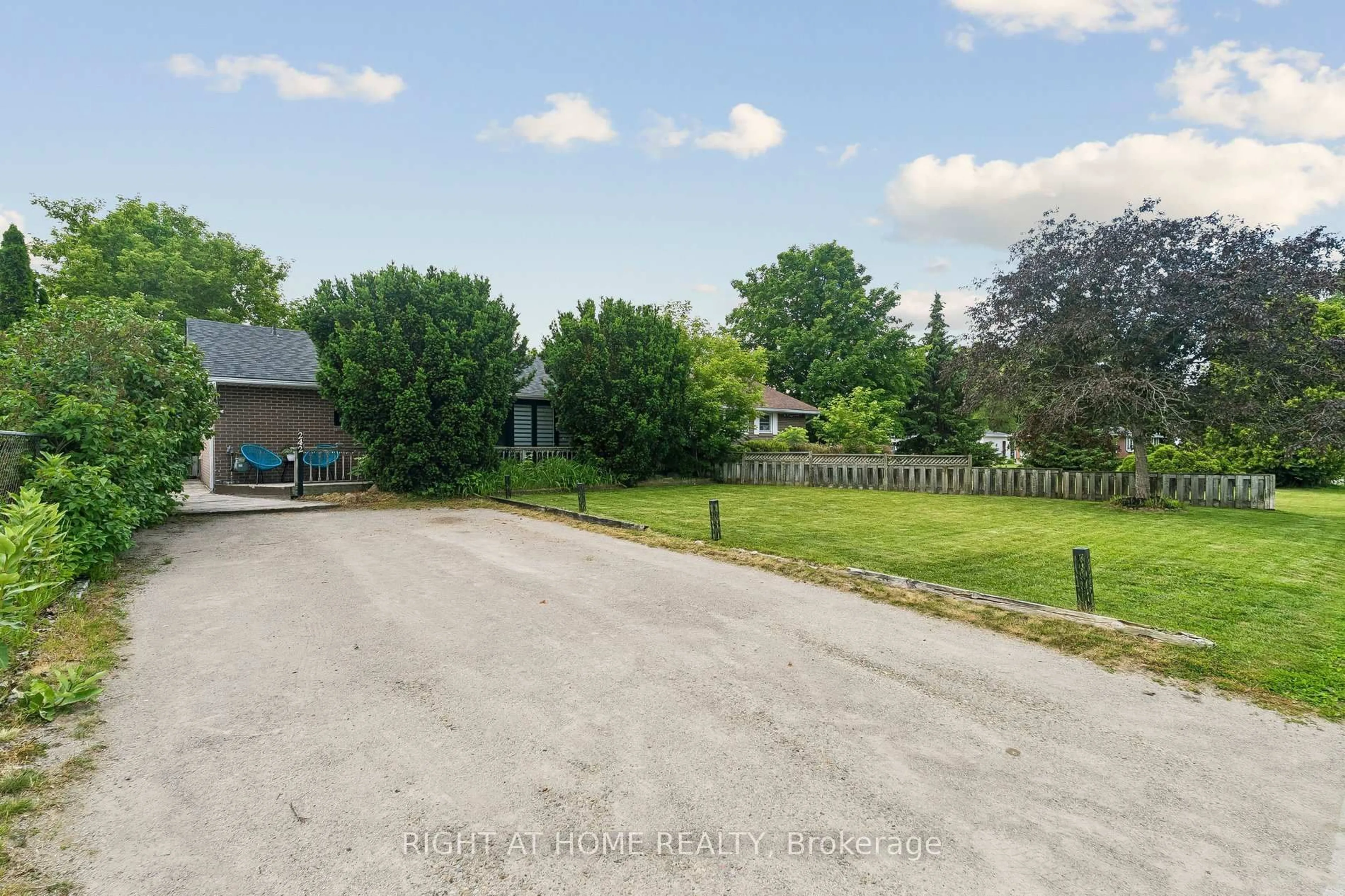 A pic from outside/outdoor area/front of a property/back of a property/a pic from drone, street for 242 Centre St, Essa Ontario L0M 1B0