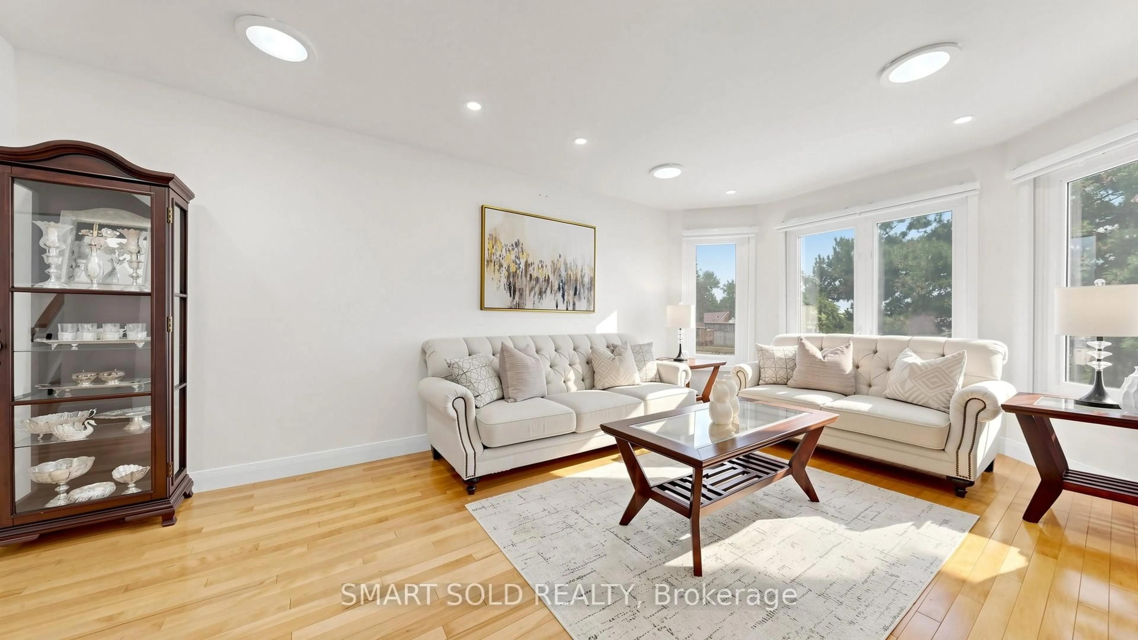 Living room with furniture, wood/laminate floor for 156 Brammar St, Newmarket Ontario L3Y 7T3
