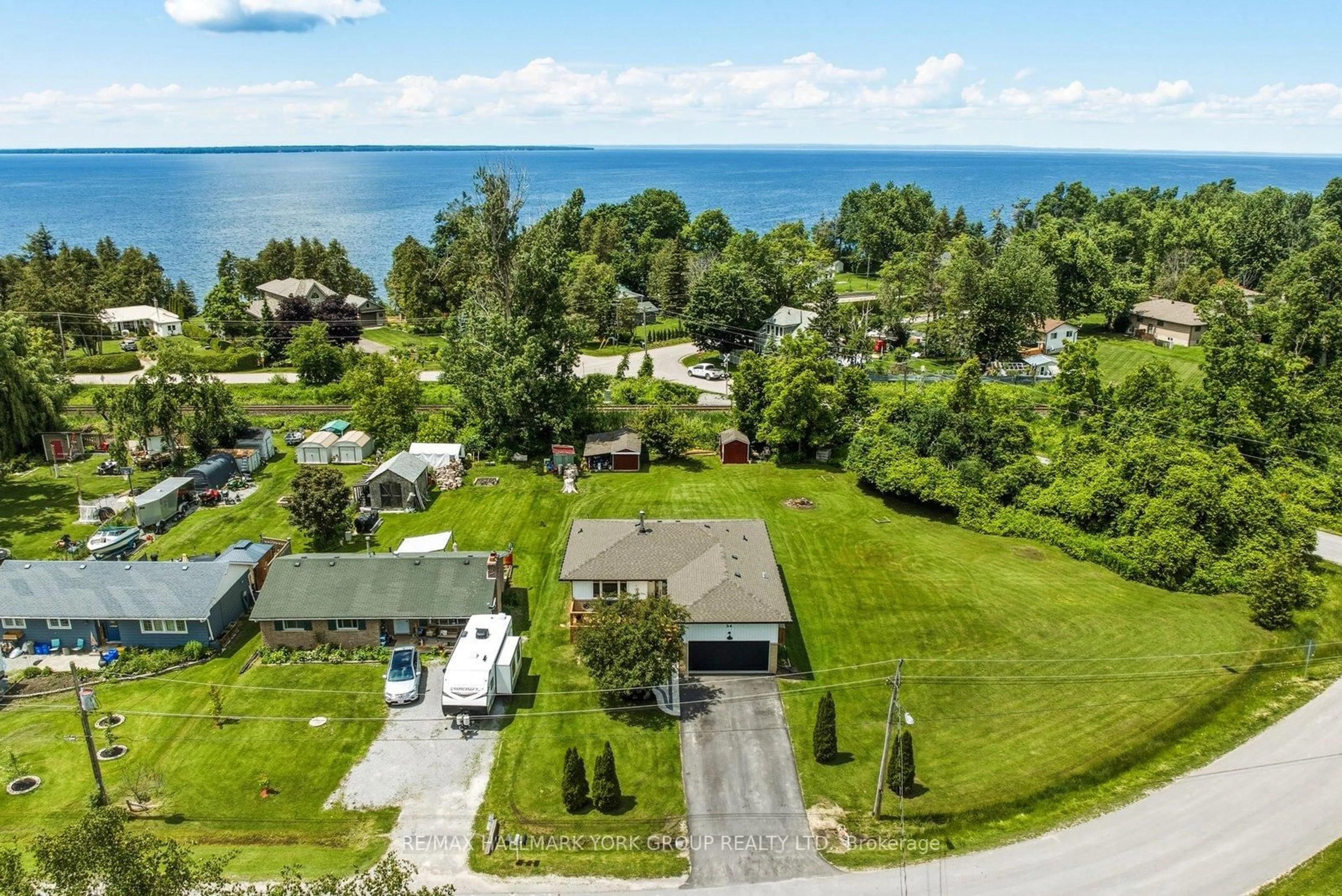 A pic from outside/outdoor area/front of a property/back of a property/a pic from drone, water/lake/river/ocean view for 54 Twmarc Ave, Brock Ontario L0K 1A0