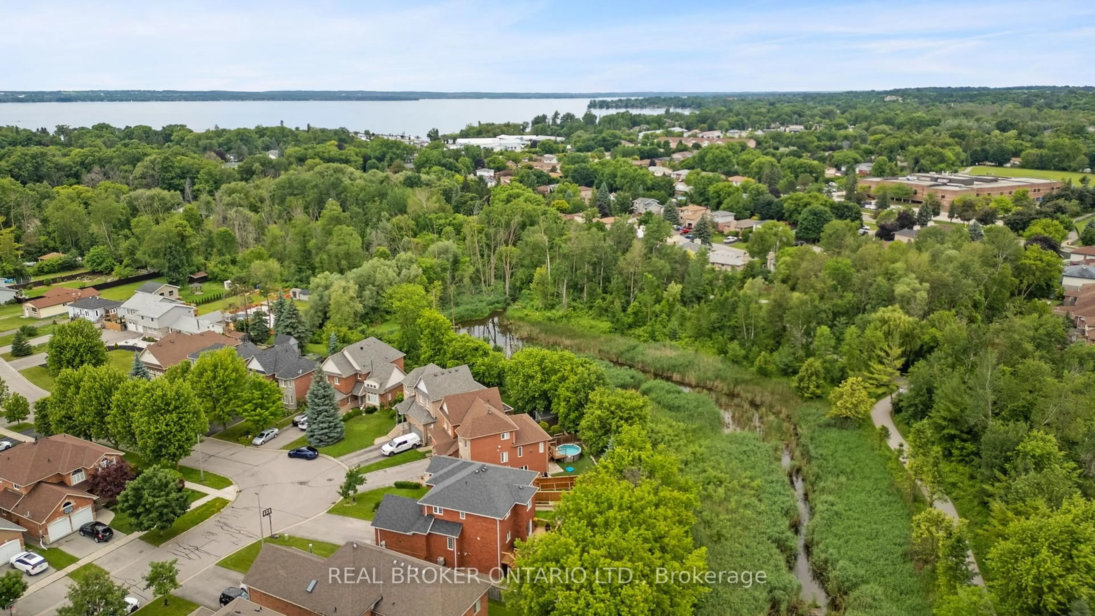 A pic from outside/outdoor area/front of a property/back of a property/a pic from drone, water/lake/river/ocean view for 118 Bayview Ave, Georgina Ontario L4P 2S9