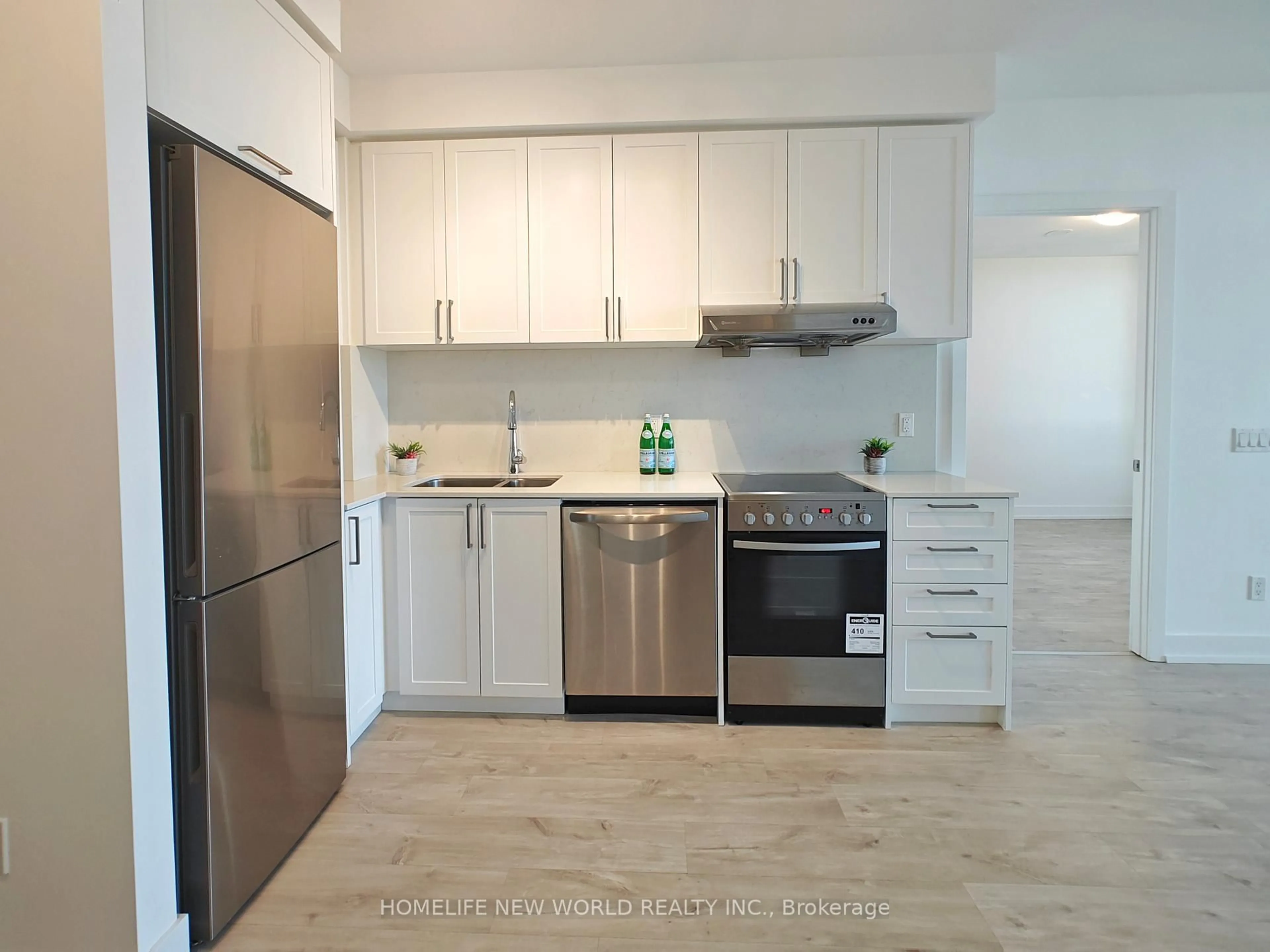 Standard kitchen, wood/laminate floor for 268 Buchanan Dr #719W, Markham Ontario L3R 8G9