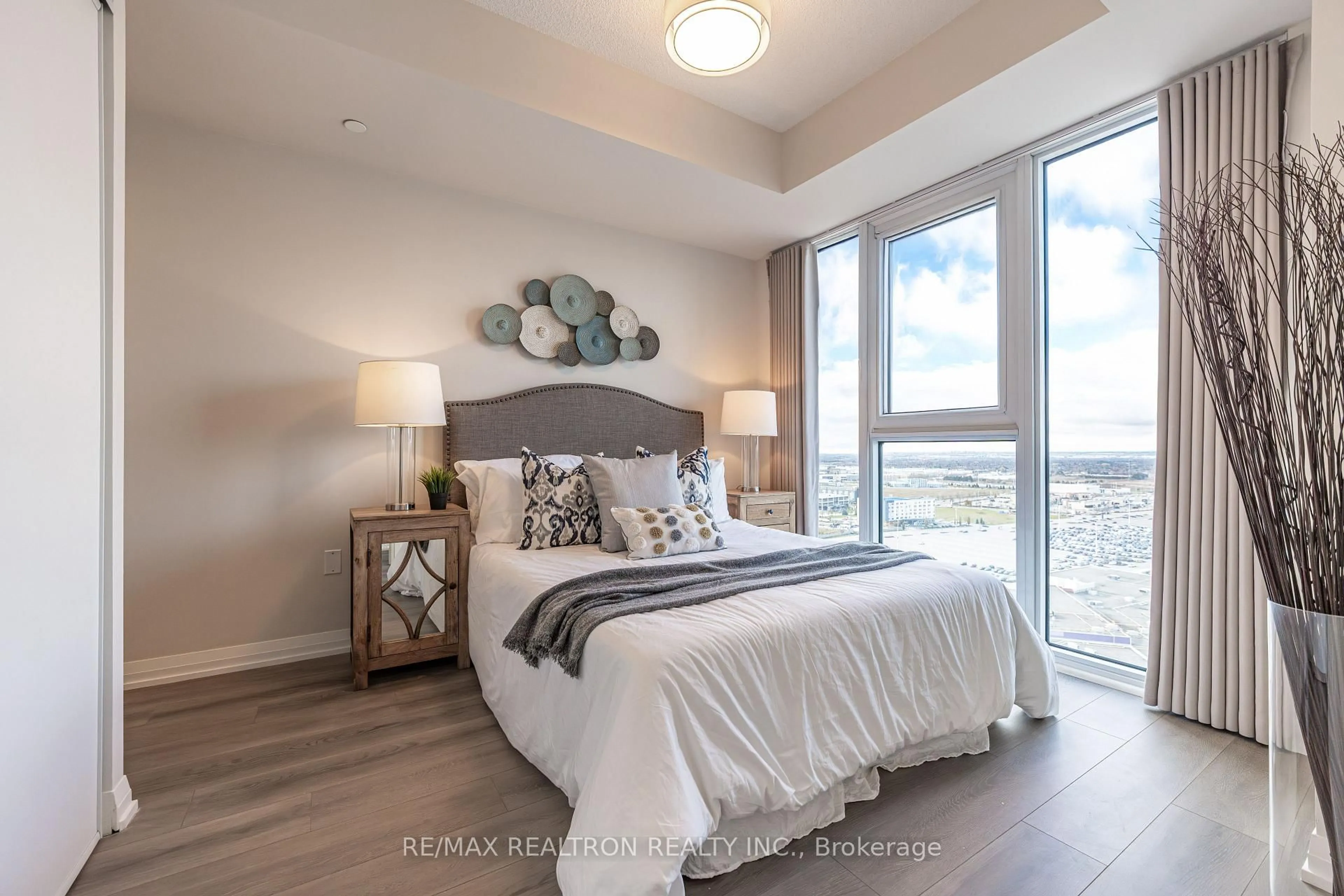 Bedroom with bed, wood/laminate floor for 9000 Jane St #2120, Vaughan Ontario L4K 0M6
