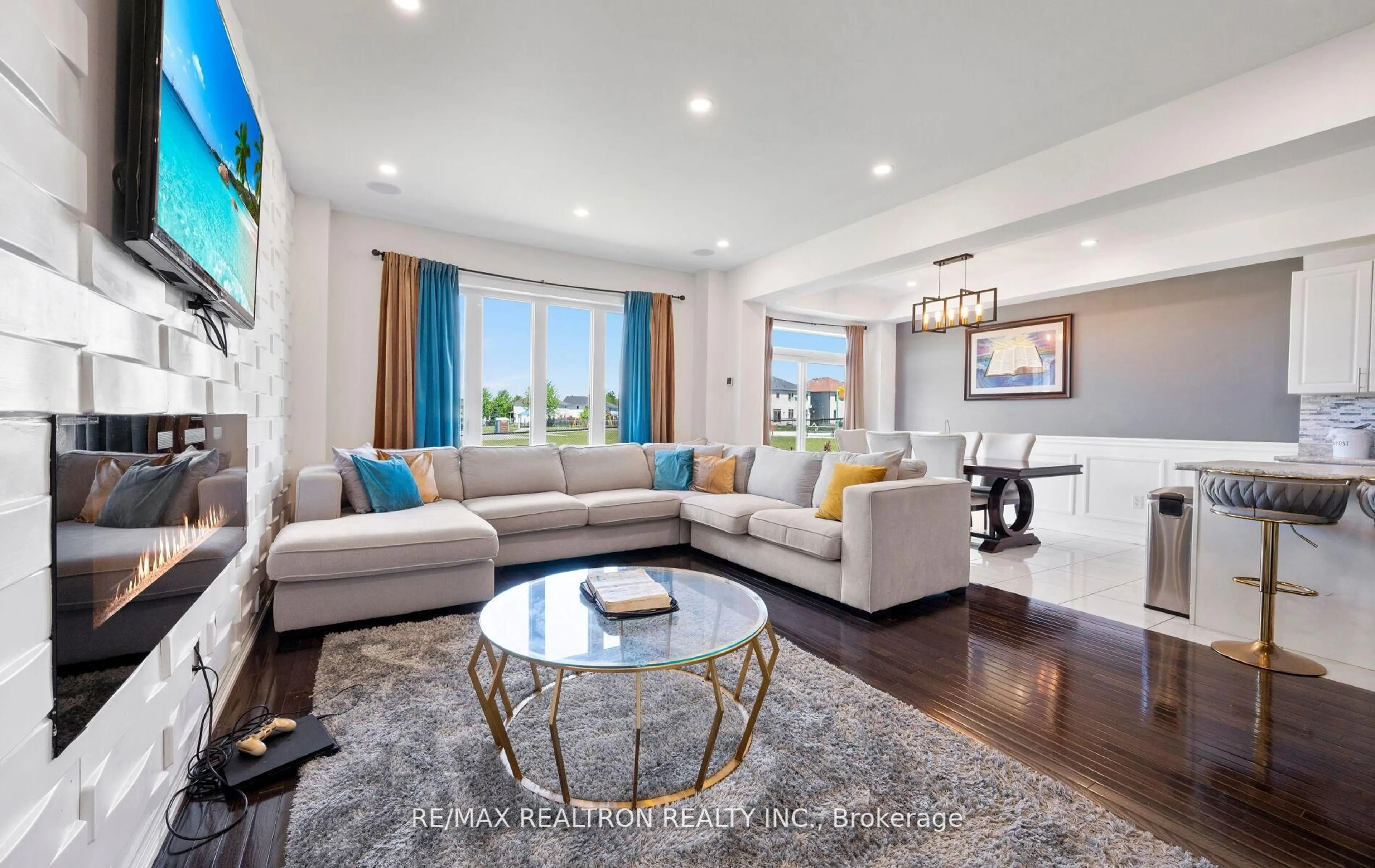 Living room with furniture, unknown for 57 Sasco Way, Essa Ontario L3W 0C8