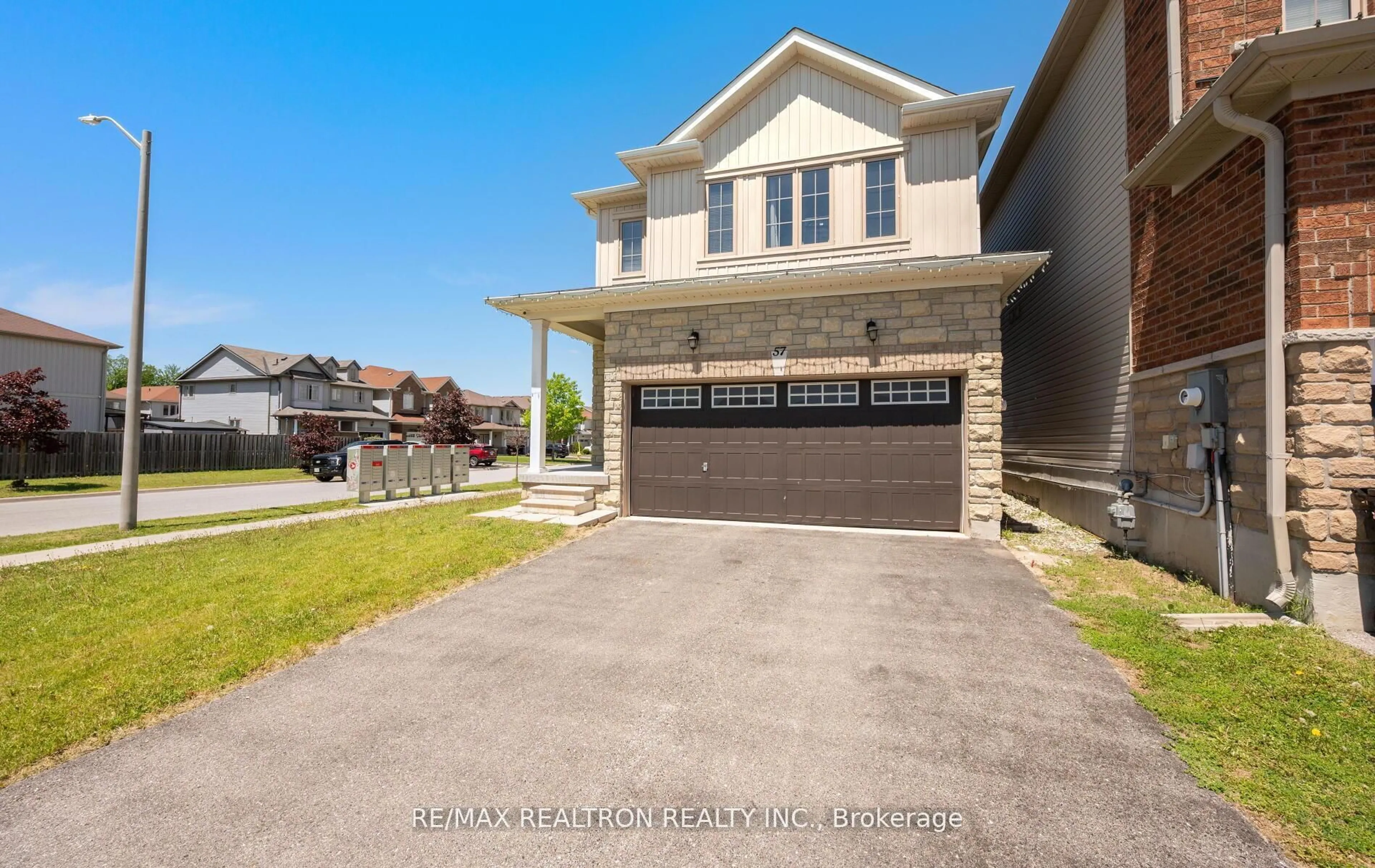 A pic from outside/outdoor area/front of a property/back of a property/a pic from drone, street for 57 Sasco Way, Essa Ontario L3W 0C8