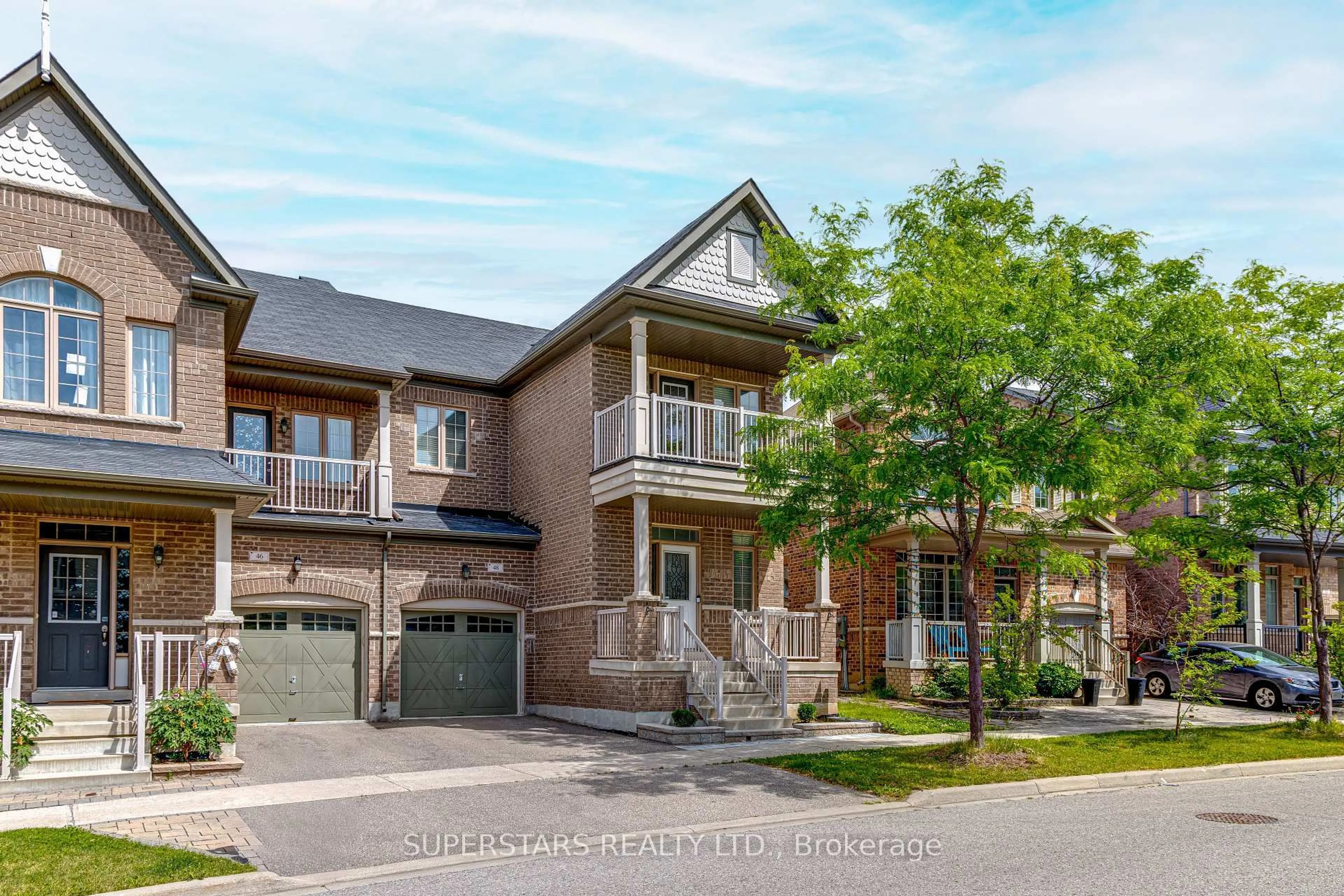 Home with brick exterior material, street for 48 Manila Ave, Markham Ontario L6C 0W2
