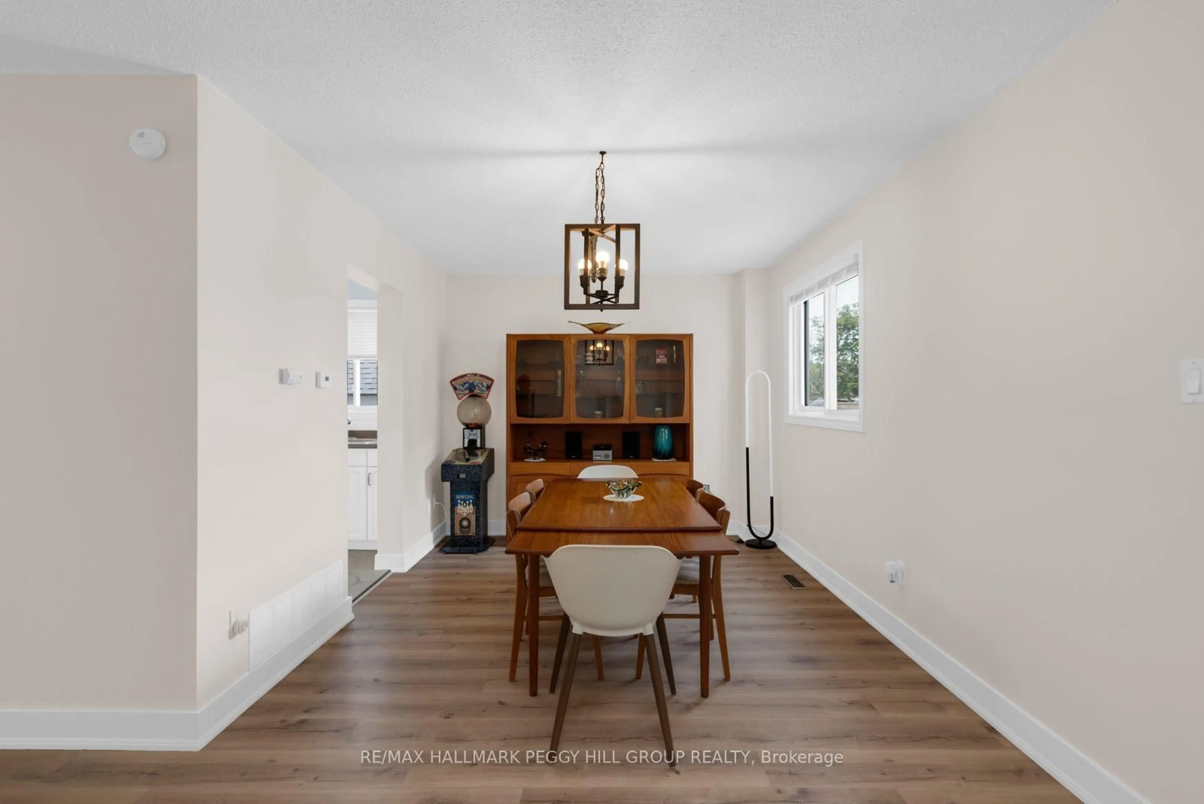 Dining room, wood/laminate floor for 990 MacLean St, Innisfil Ontario L9S 1V8