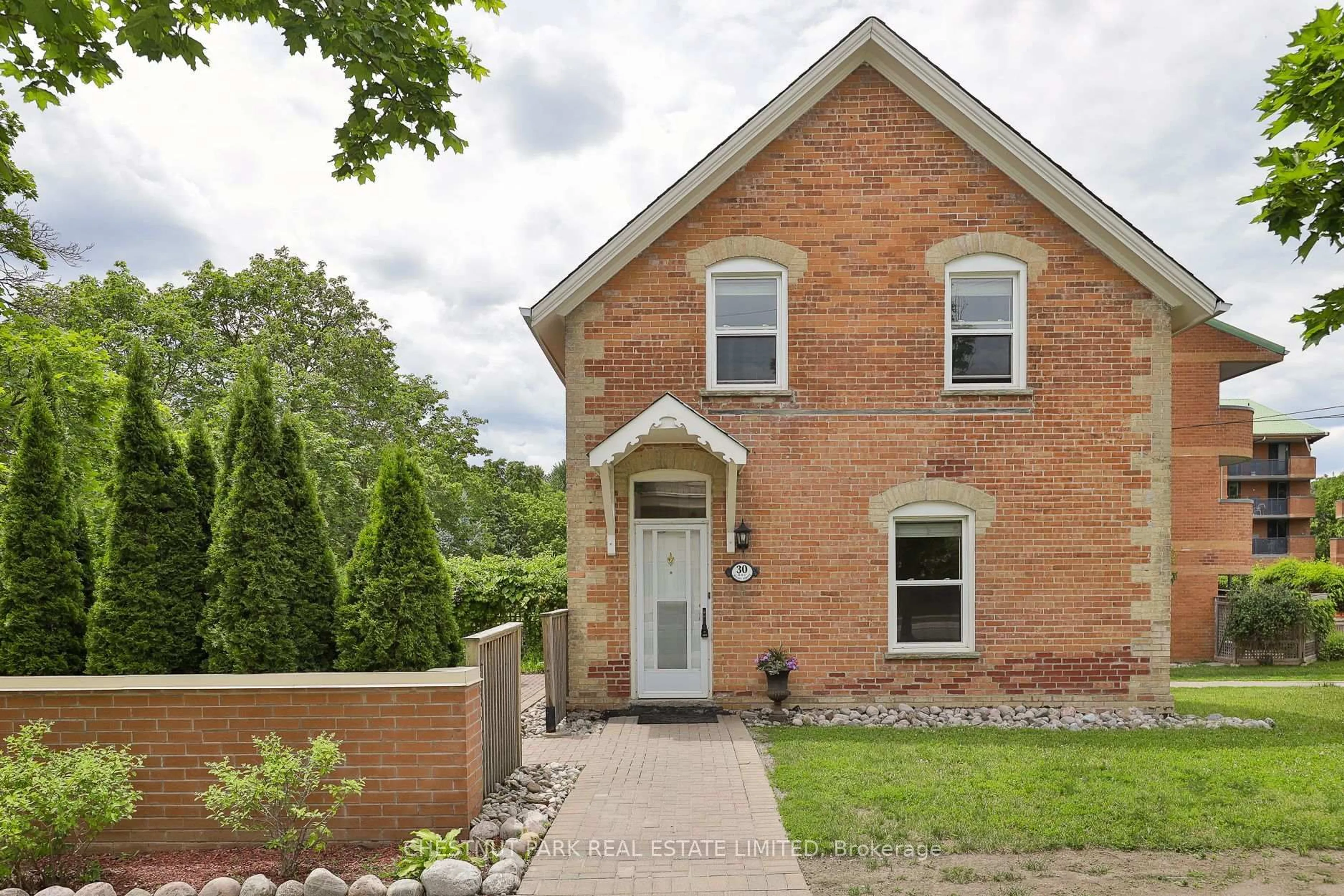Home with brick exterior material, street for 30 Wilson St #110, Markham Ontario L3P 1N1