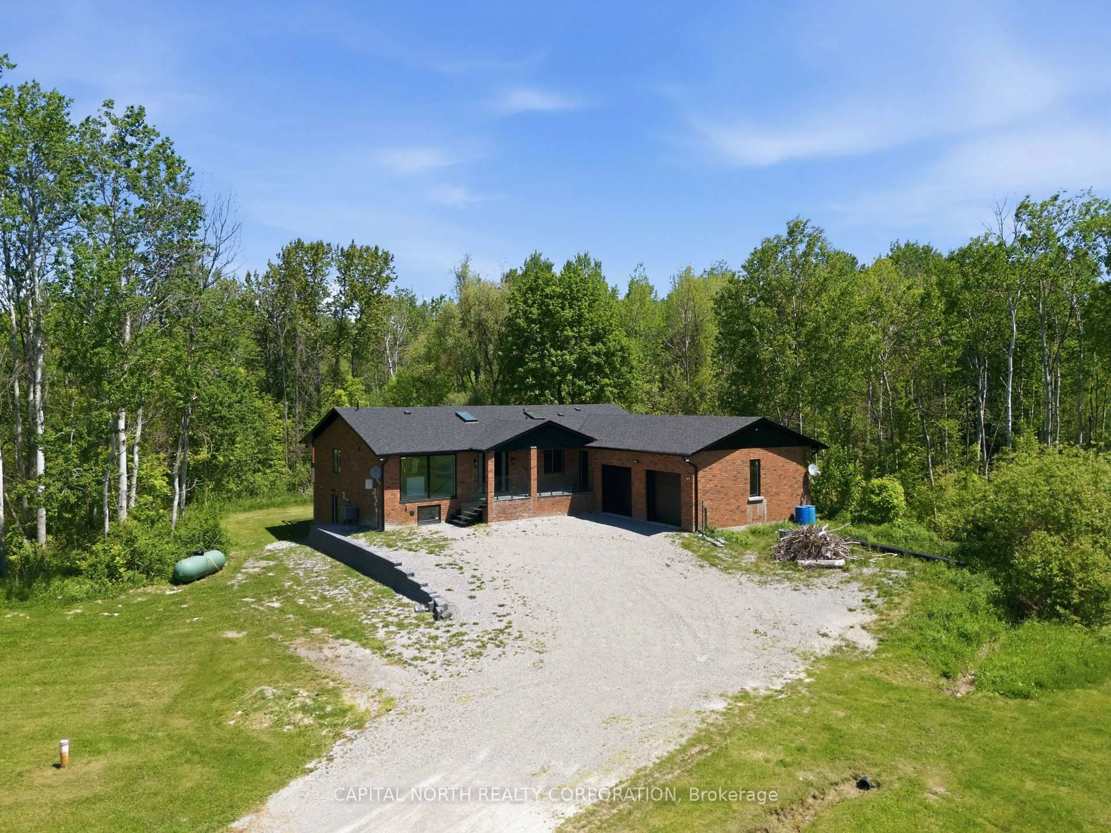 A pic from outside/outdoor area/front of a property/back of a property/a pic from drone, unknown for 26375 Woodbine Ave, Georgina Ontario L4P 3E9