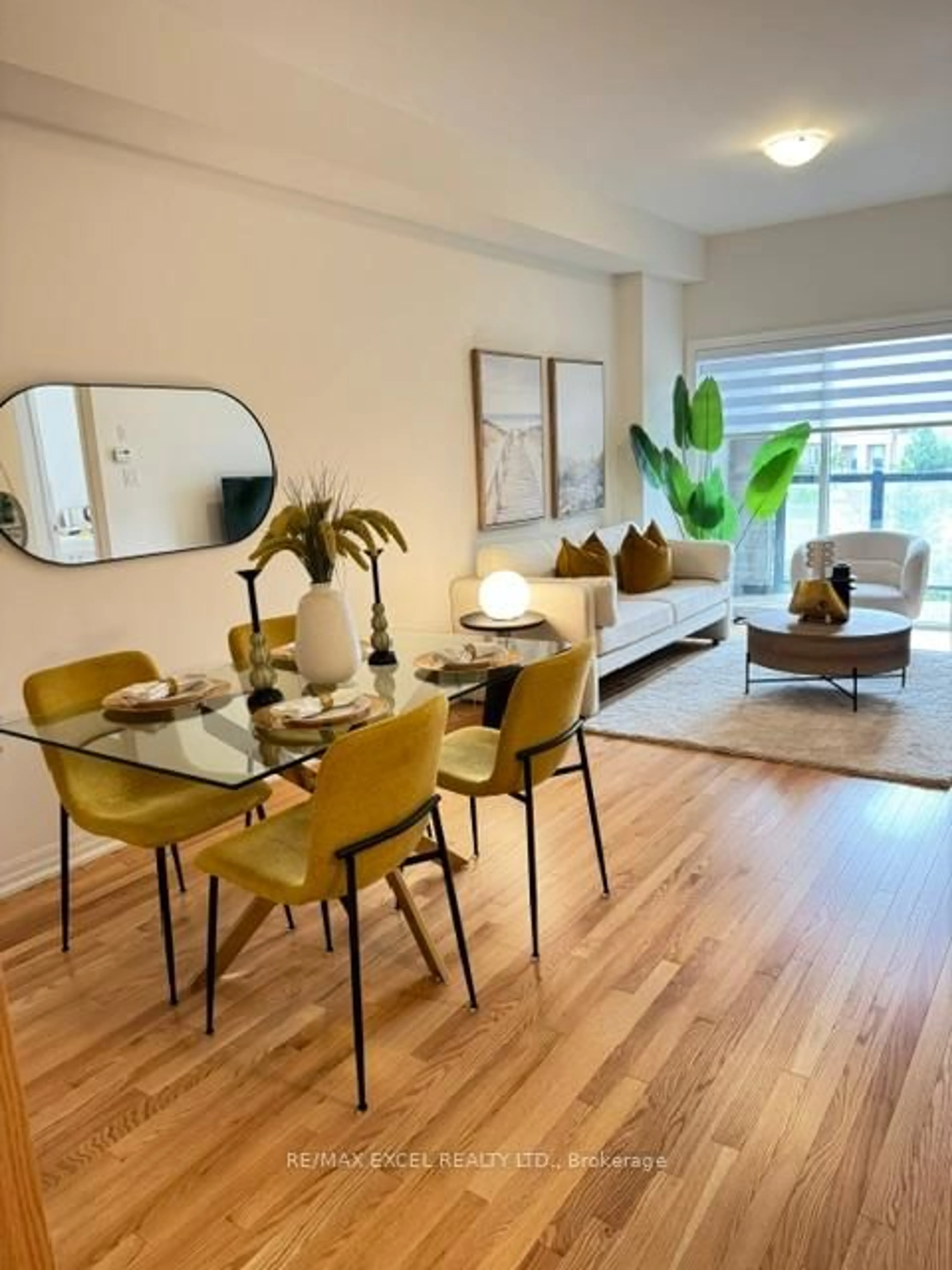 Living room with furniture, wood/laminate floor for 190 Vantage Loop, Newmarket Ontario L3X 0L3