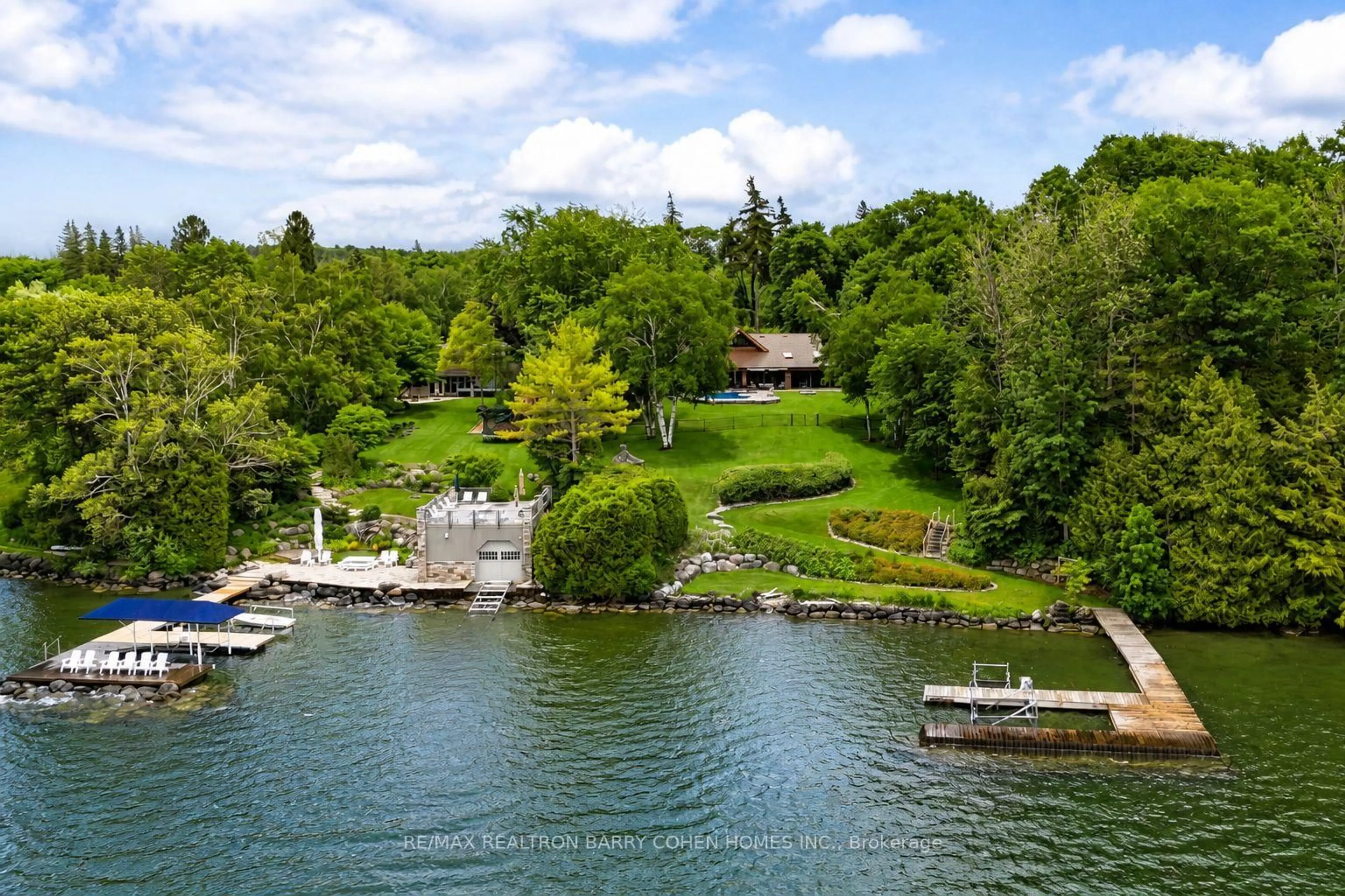 A pic from outside/outdoor area/front of a property/back of a property/a pic from drone, water/lake/river/ocean view for 700 Lake Dr, Georgina Ontario L4P 3C8