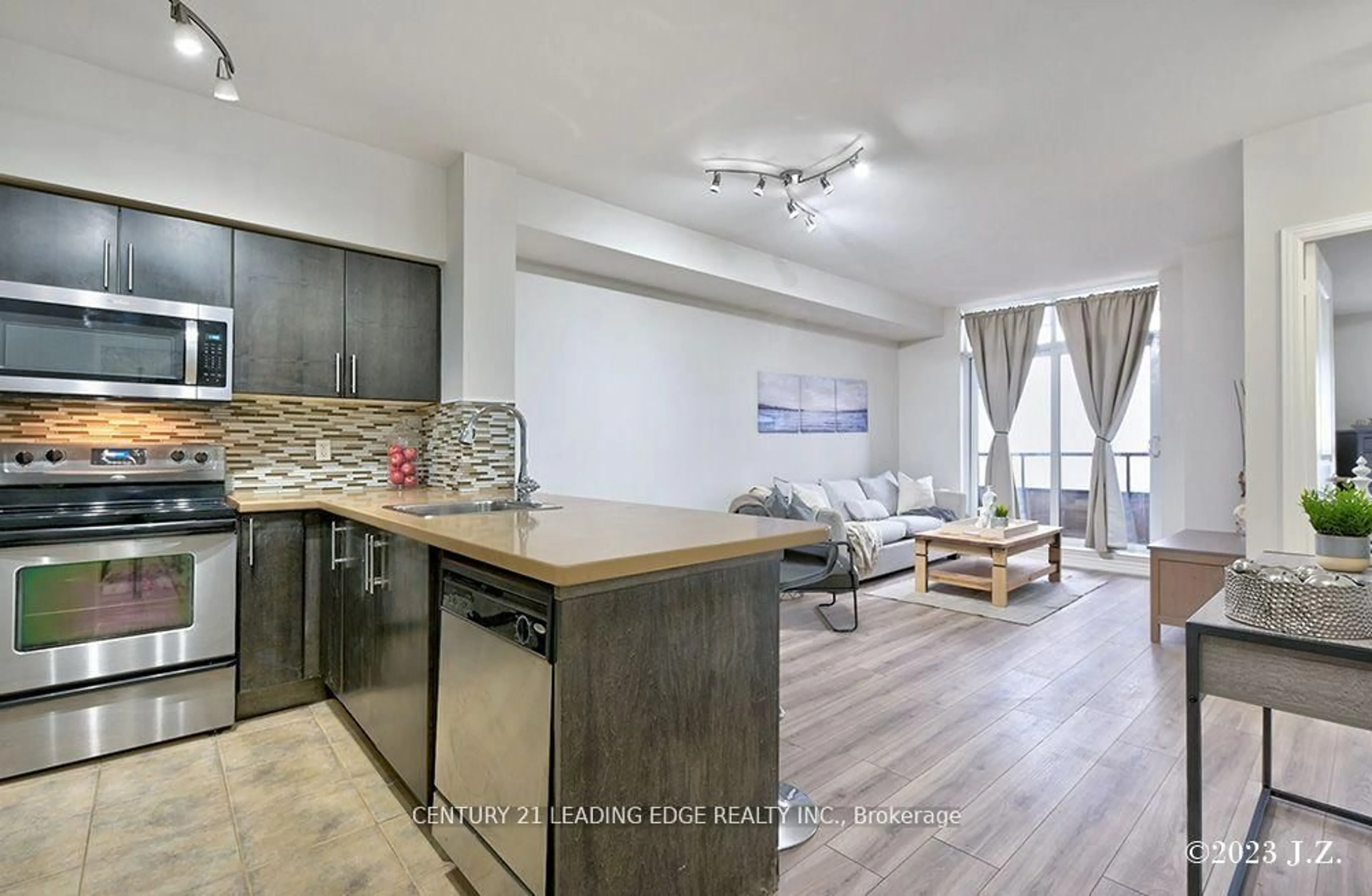 Open concept kitchen, wood/laminate floor for 9225 Jane St #911, Vaughan Ontario L6A 0J7