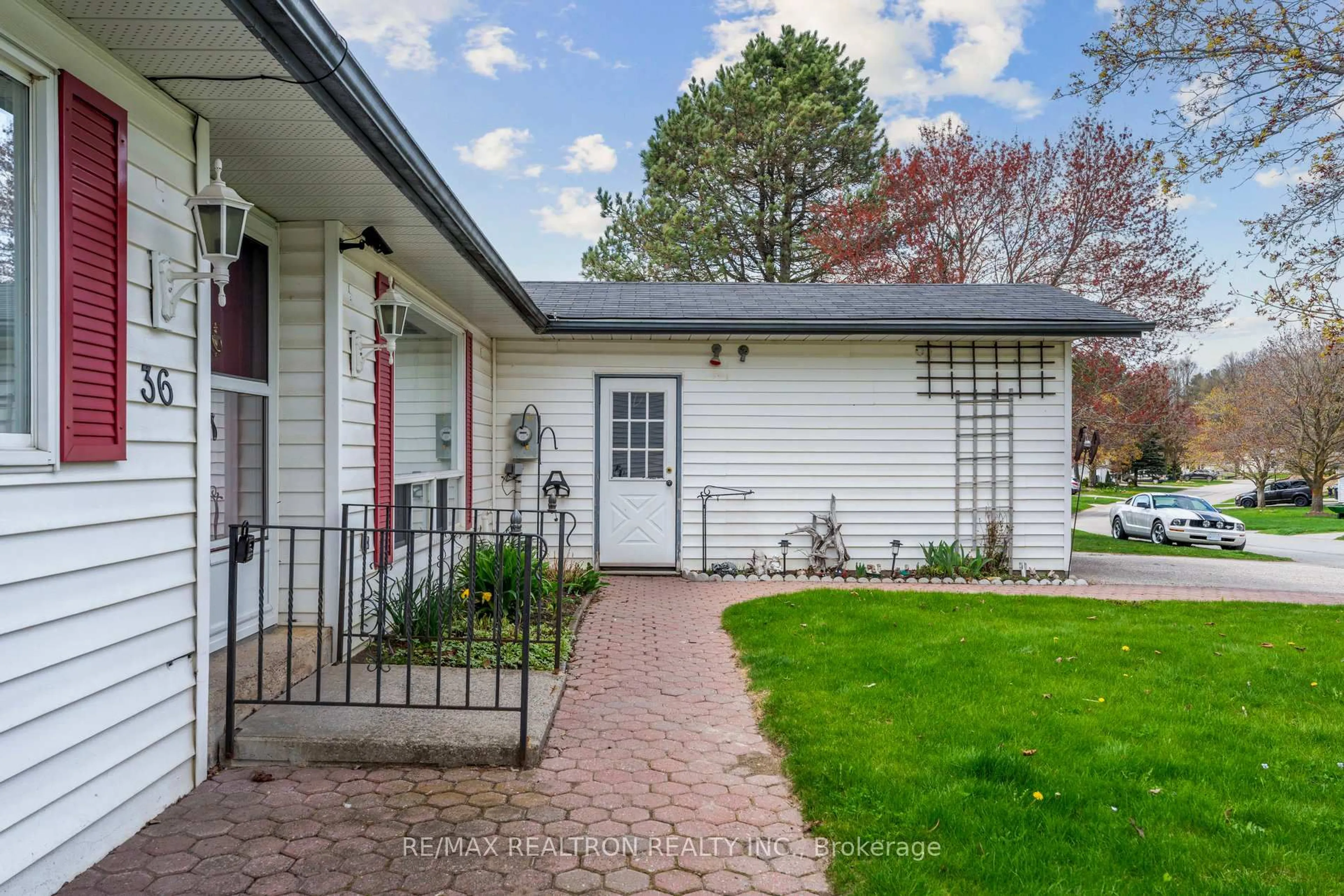Home with brick exterior material, street for 36 Tecumseth Pines Dr, New Tecumseth Ontario L0G 1W0
