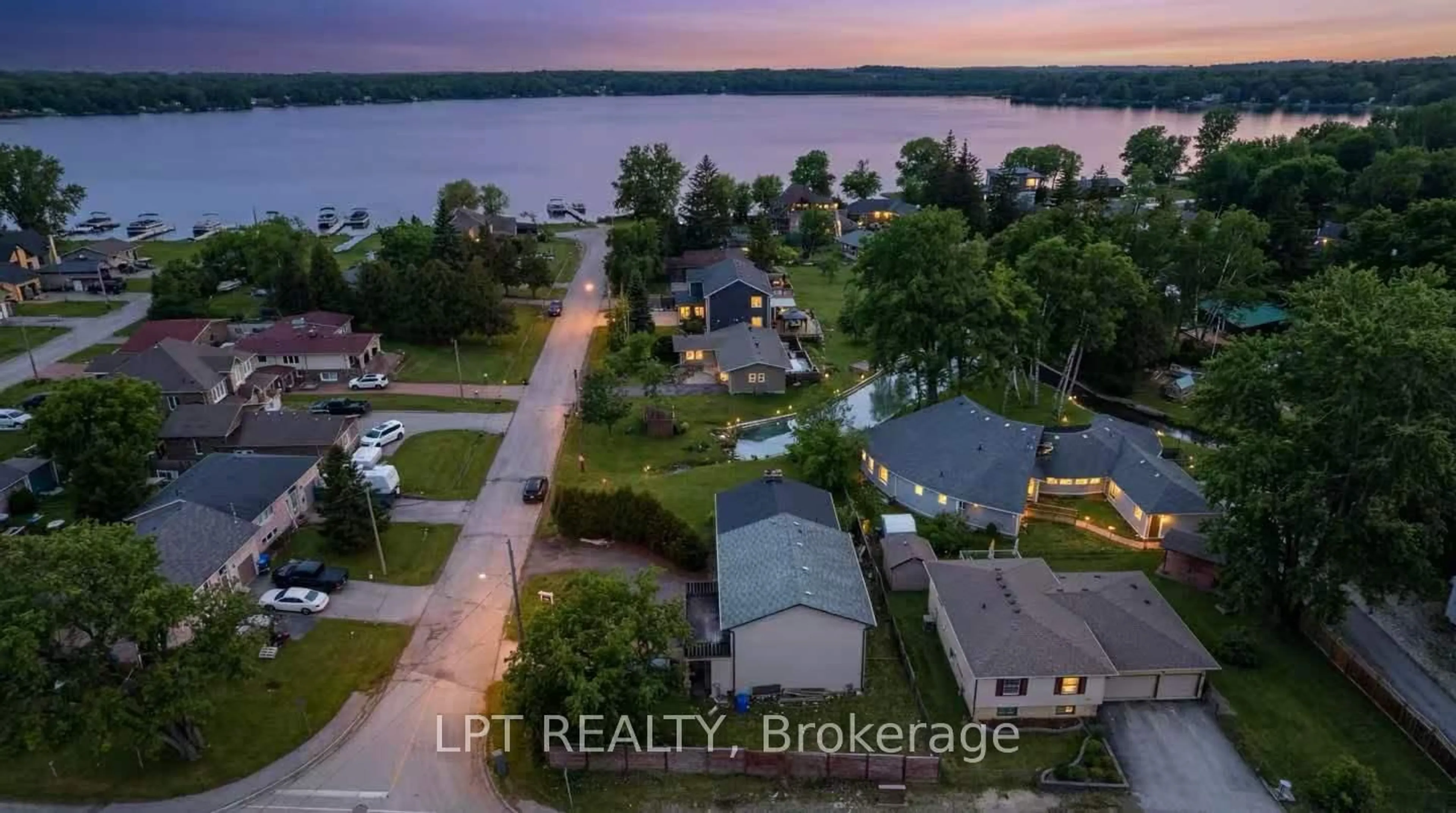 A pic from outside/outdoor area/front of a property/back of a property/a pic from drone, water/lake/river/ocean view for 194 South Channel Dr, Georgina Ontario L4P 2N3