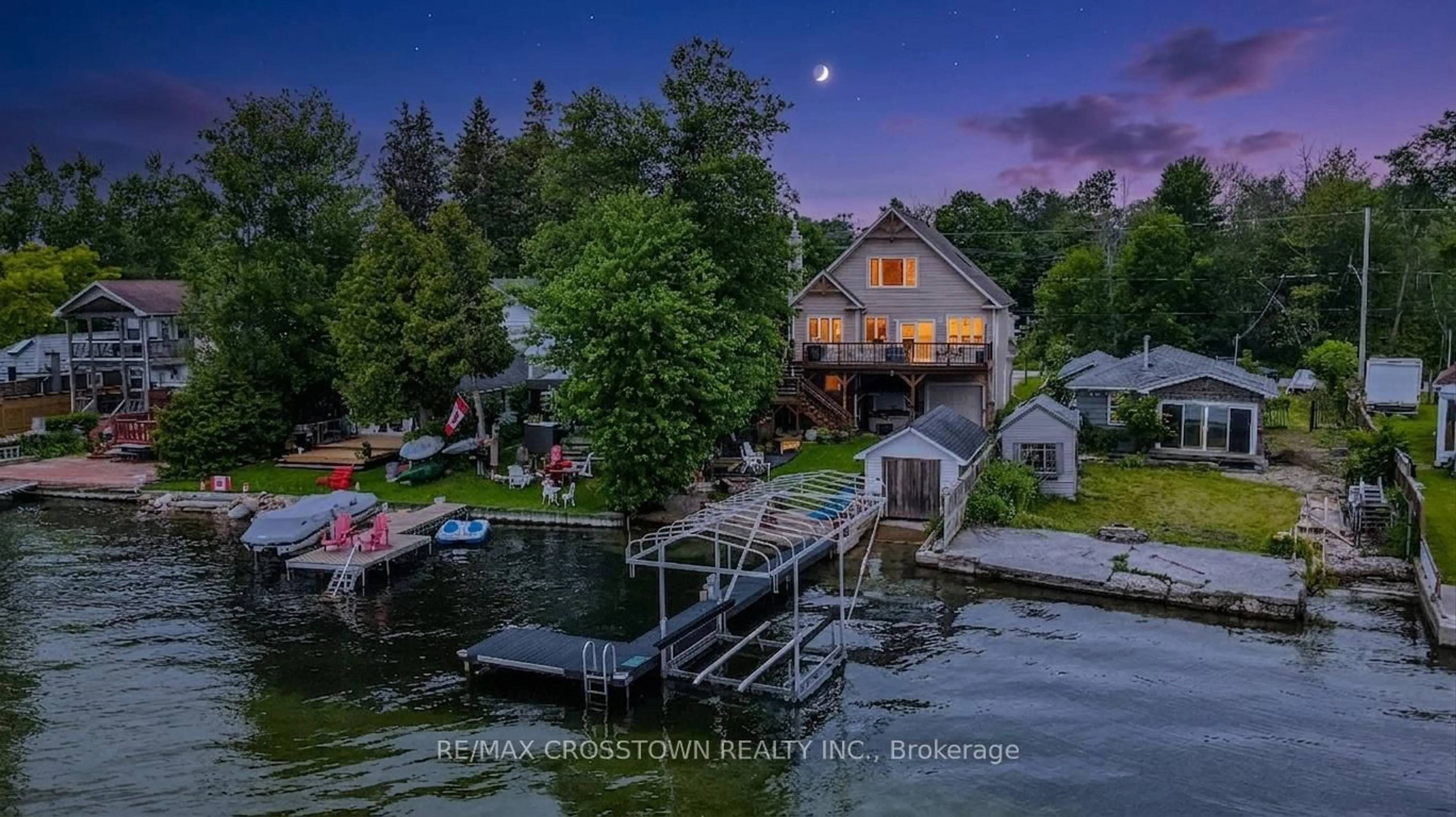 A pic from outside/outdoor area/front of a property/back of a property/a pic from drone, water/lake/river/ocean view for 2325 Crystal Beach Rd, Innisfil Ontario L9S 3W8