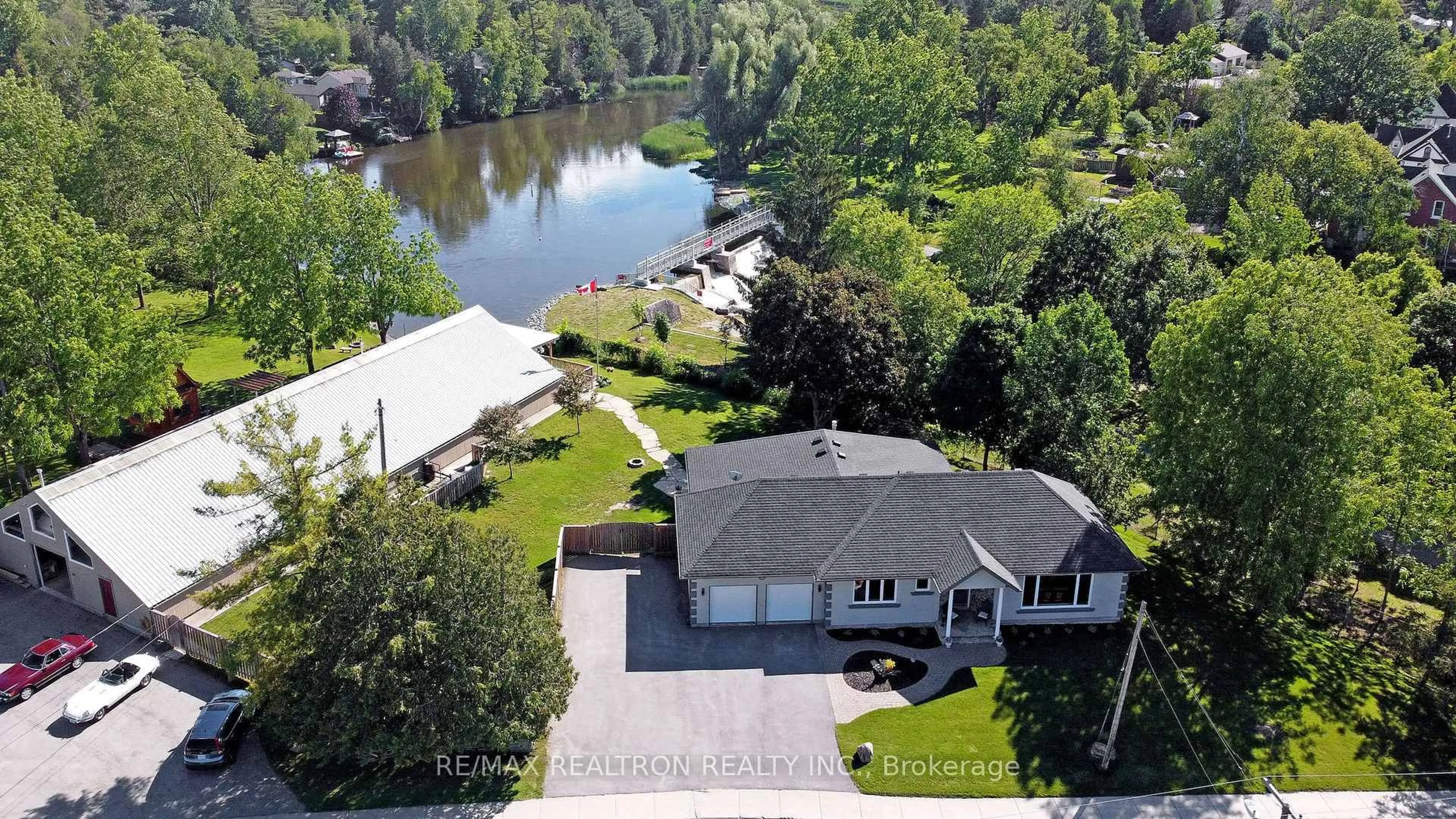 A pic from outside/outdoor area/front of a property/back of a property/a pic from drone, water/lake/river/ocean view for 203 Pefferlaw Rd, Georgina Ontario L0E 1N0