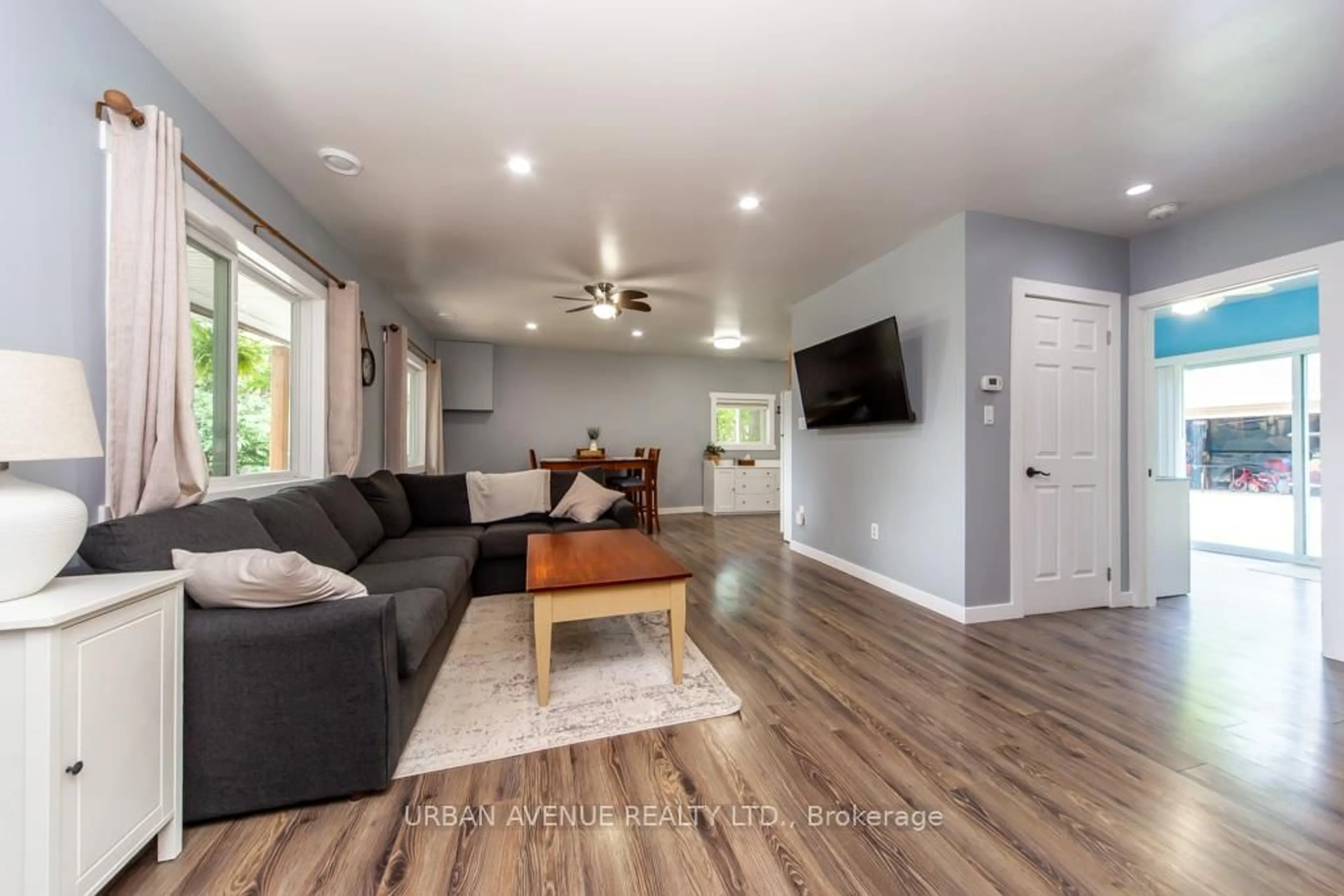 Living room with furniture, wood/laminate floor for 23505 Lakeridge Rd, Brock Ontario L0E 1E0
