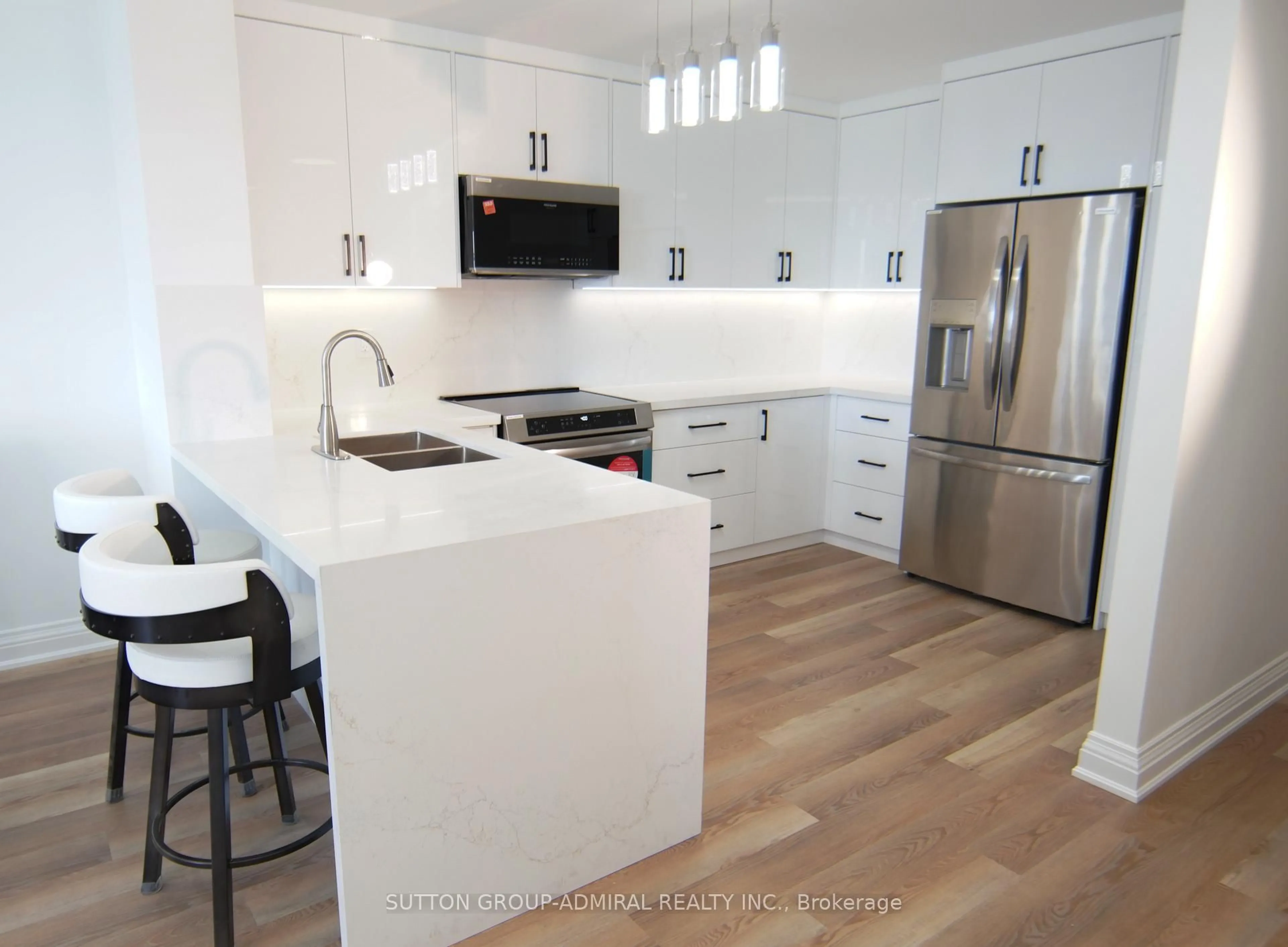 Open concept kitchen, wood/laminate floor for 7420 Bathurst St ##606, Vaughan Ontario L4J 6X4