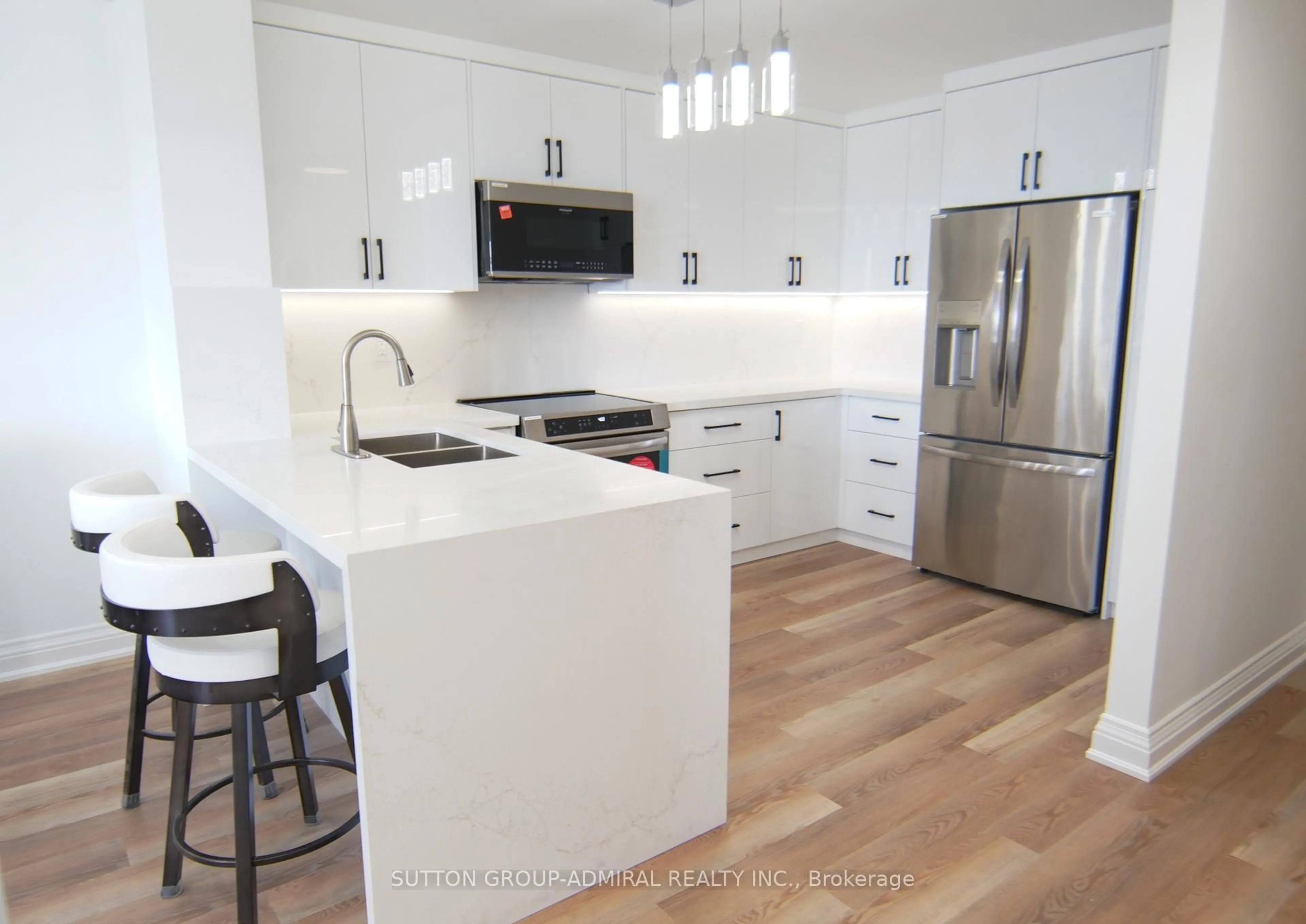 Open concept kitchen, wood/laminate floor for 7420 Bathurst St ##606, Vaughan Ontario L4J 6X4