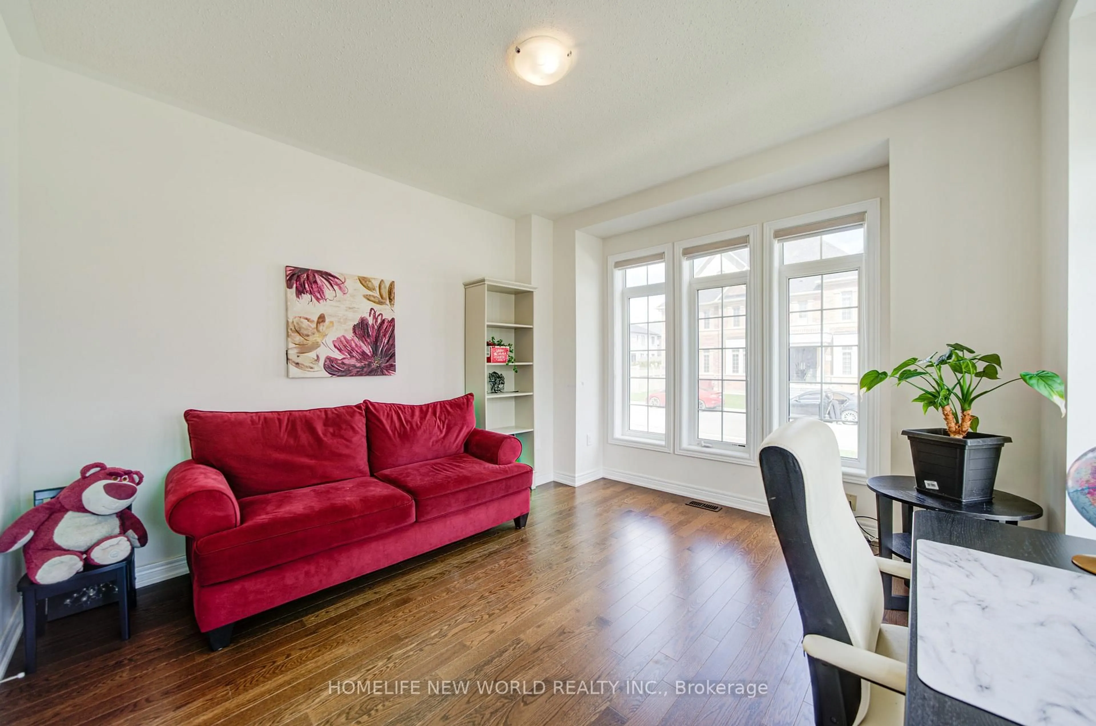 Living room with furniture, wood/laminate floor for 1 Stilton Ave, Vaughan Ontario L4H 5B9