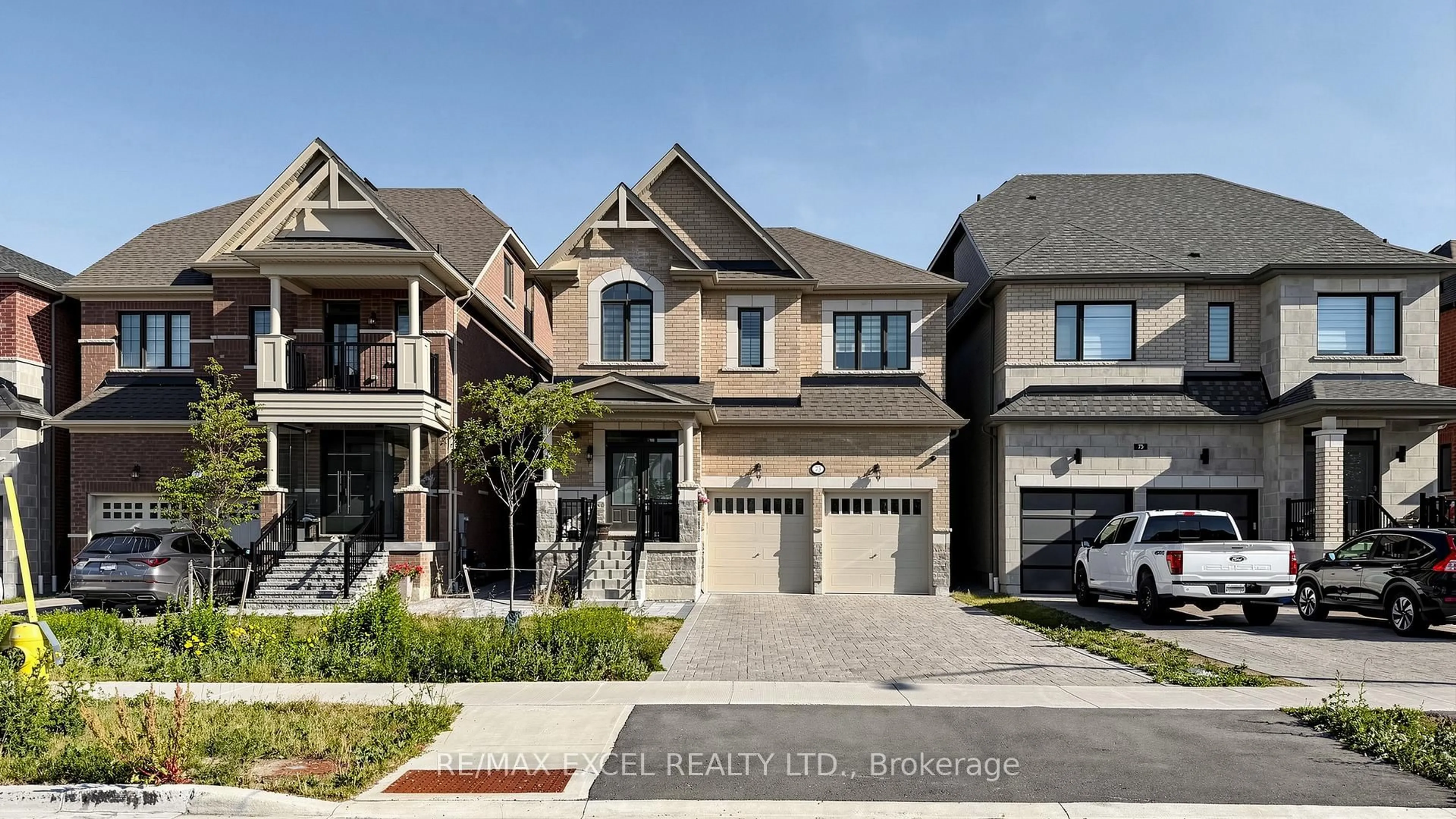 Home with brick exterior material, street for 75 Jinnah Ave, Markham Ontario L3S 0G3