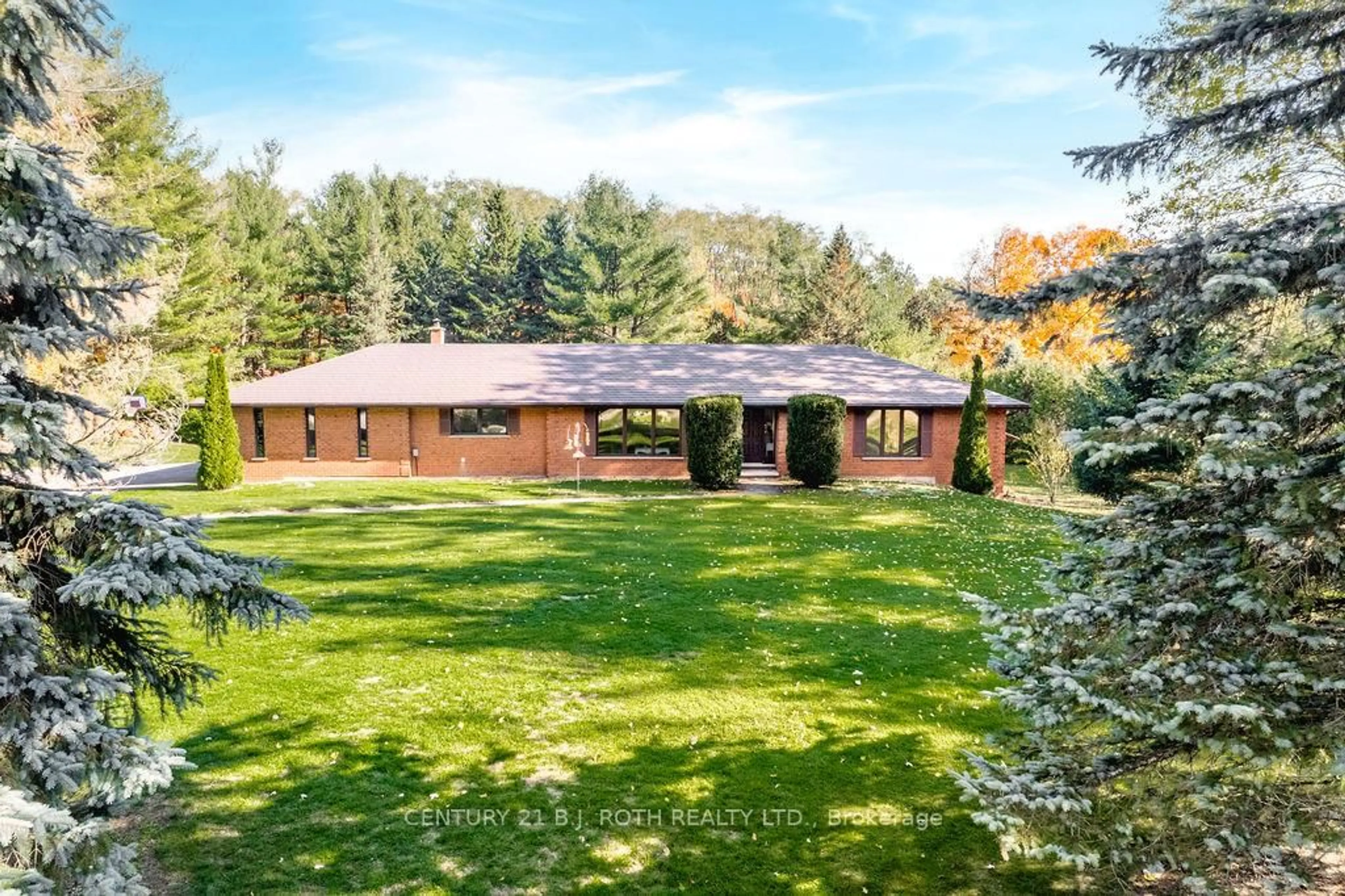 A pic from outside/outdoor area/front of a property/back of a property/a pic from drone, forest/trees view for 3257 LIAH Lane, Innisfil Ontario L9S 2B4