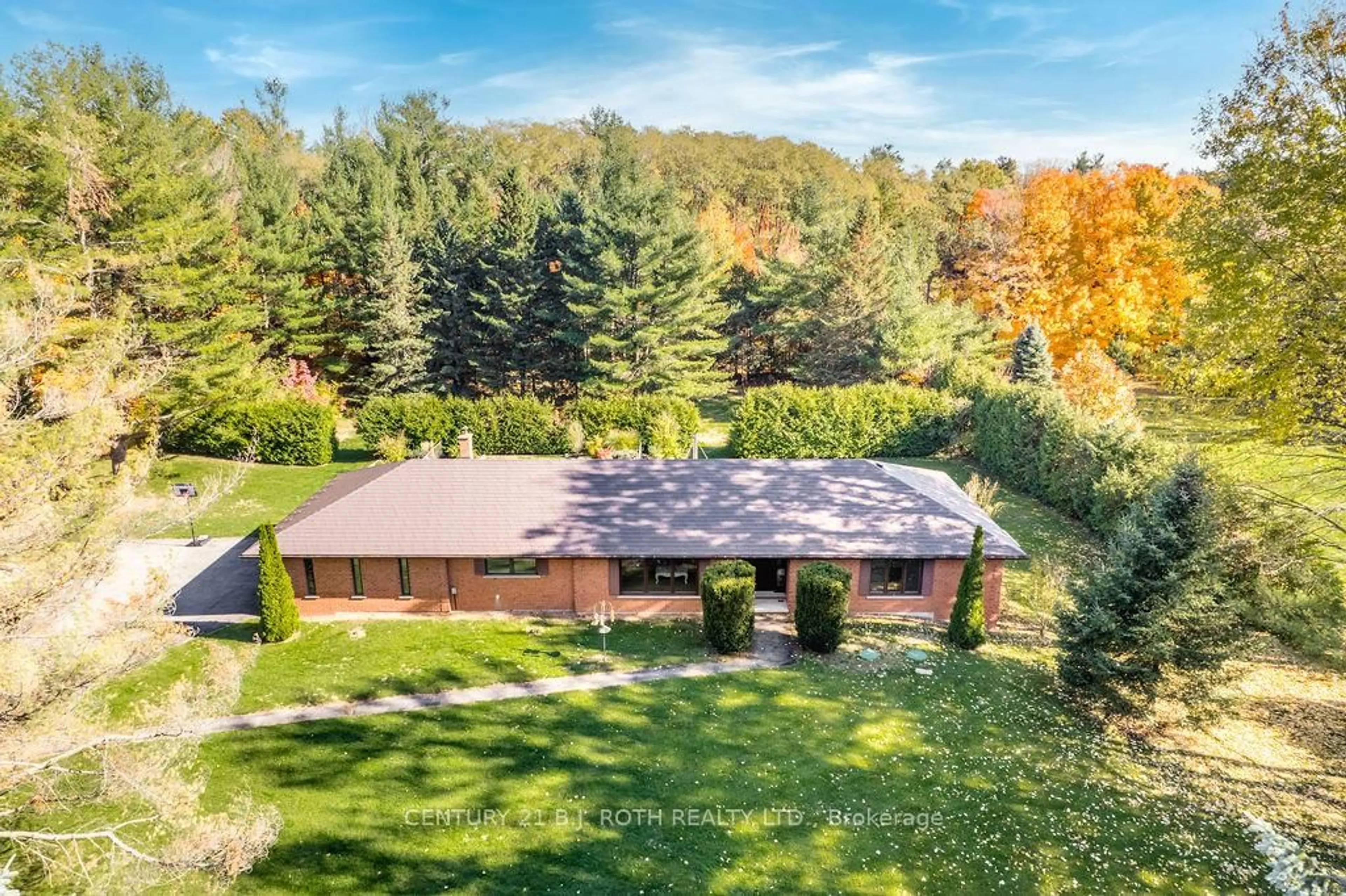 A pic from outside/outdoor area/front of a property/back of a property/a pic from drone, forest/trees view for 3257 LIAH Lane, Innisfil Ontario L9S 2B4