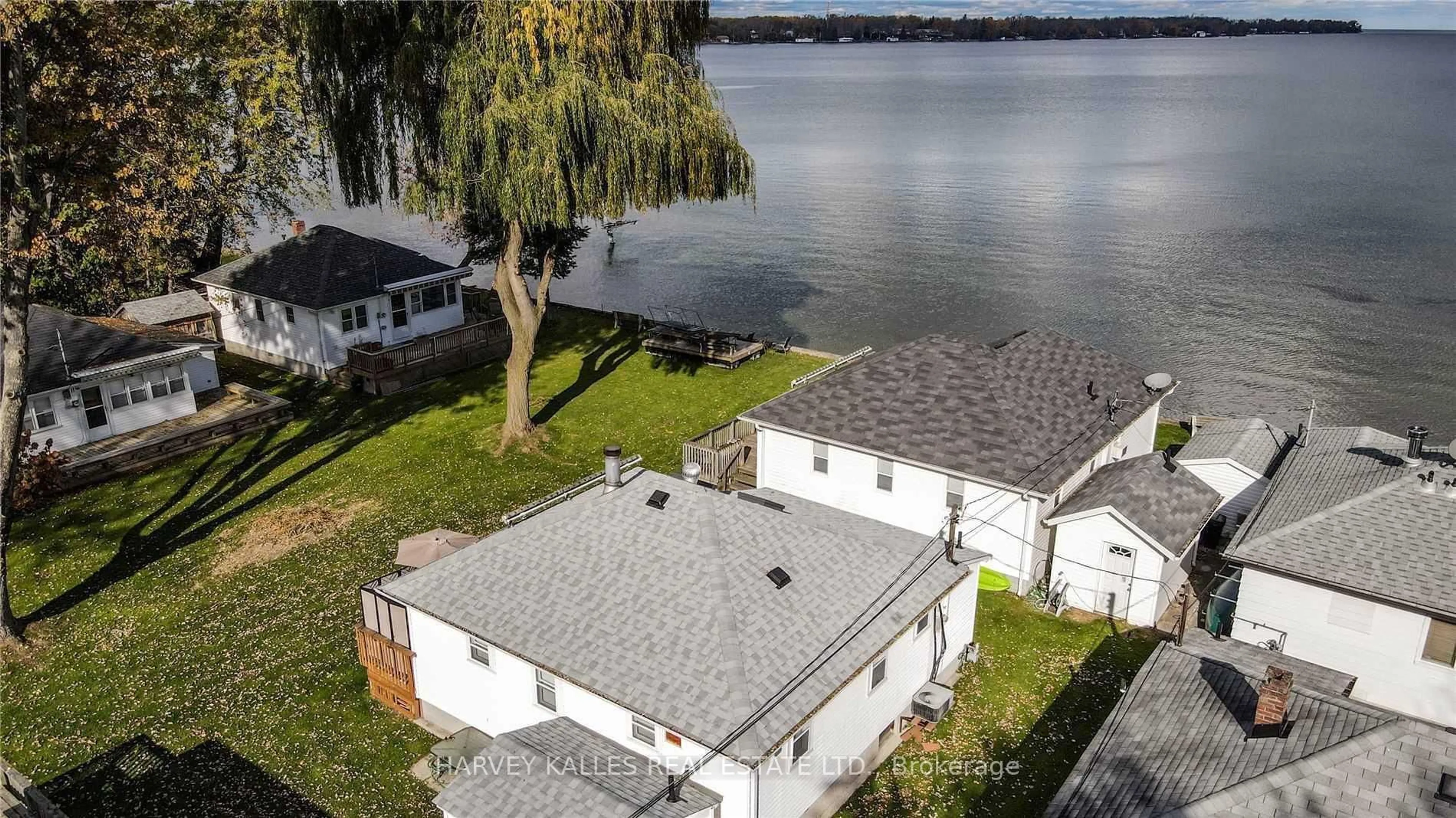 A pic from outside/outdoor area/front of a property/back of a property/a pic from drone, water/lake/river/ocean view for 1139 Claver Ave #7, Innisfil Ontario L0L 1C0