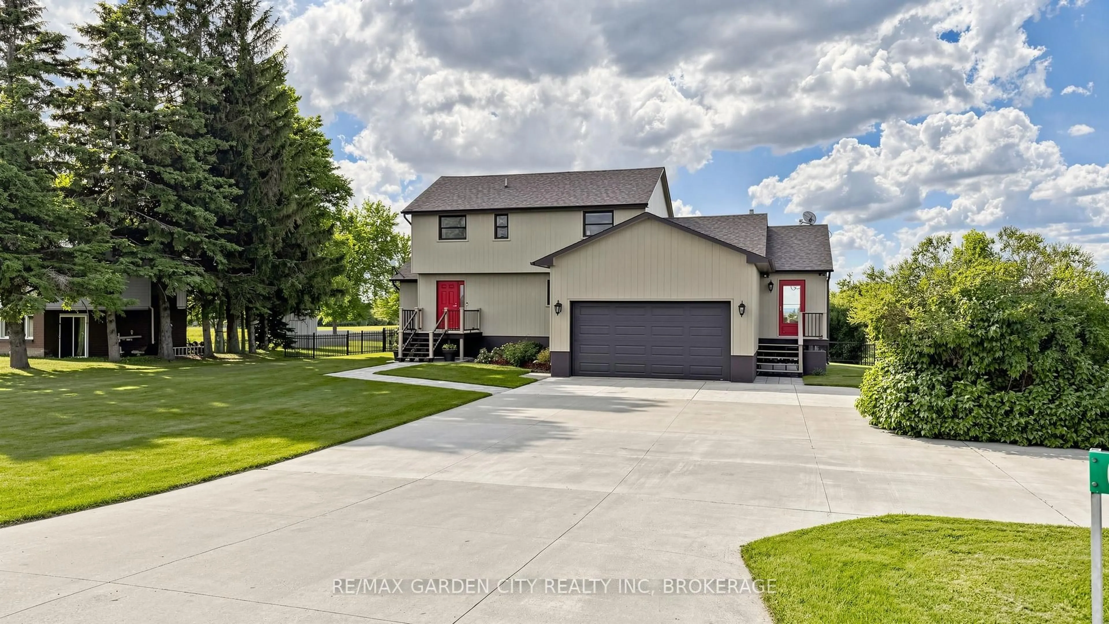 Home with vinyl exterior material, street for 6022 11th Line, Essa Ontario L0L 2N0
