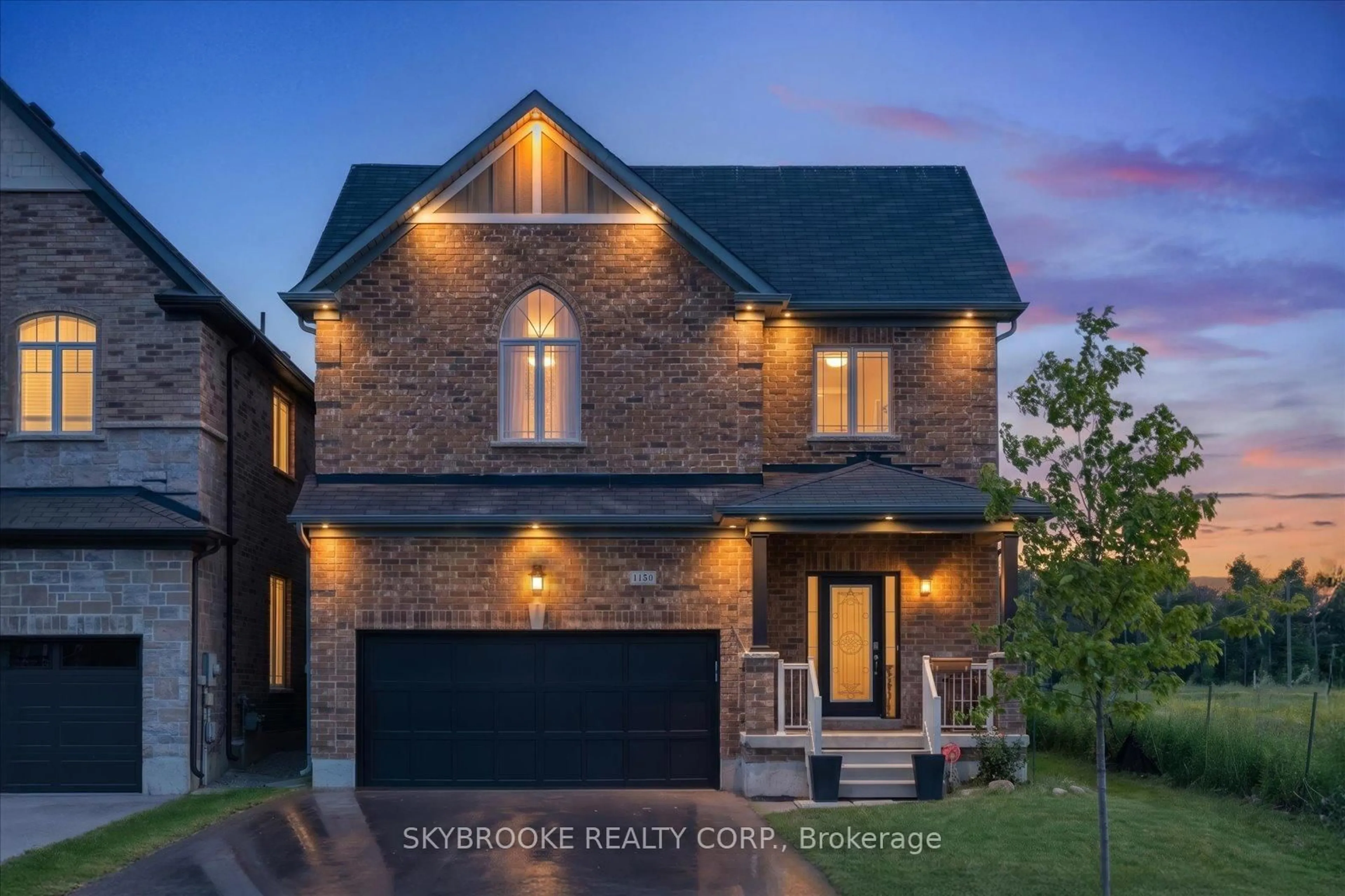 Home with brick exterior material, street for 1150 Wharram Way, Innisfil Ontario L0L 1W0