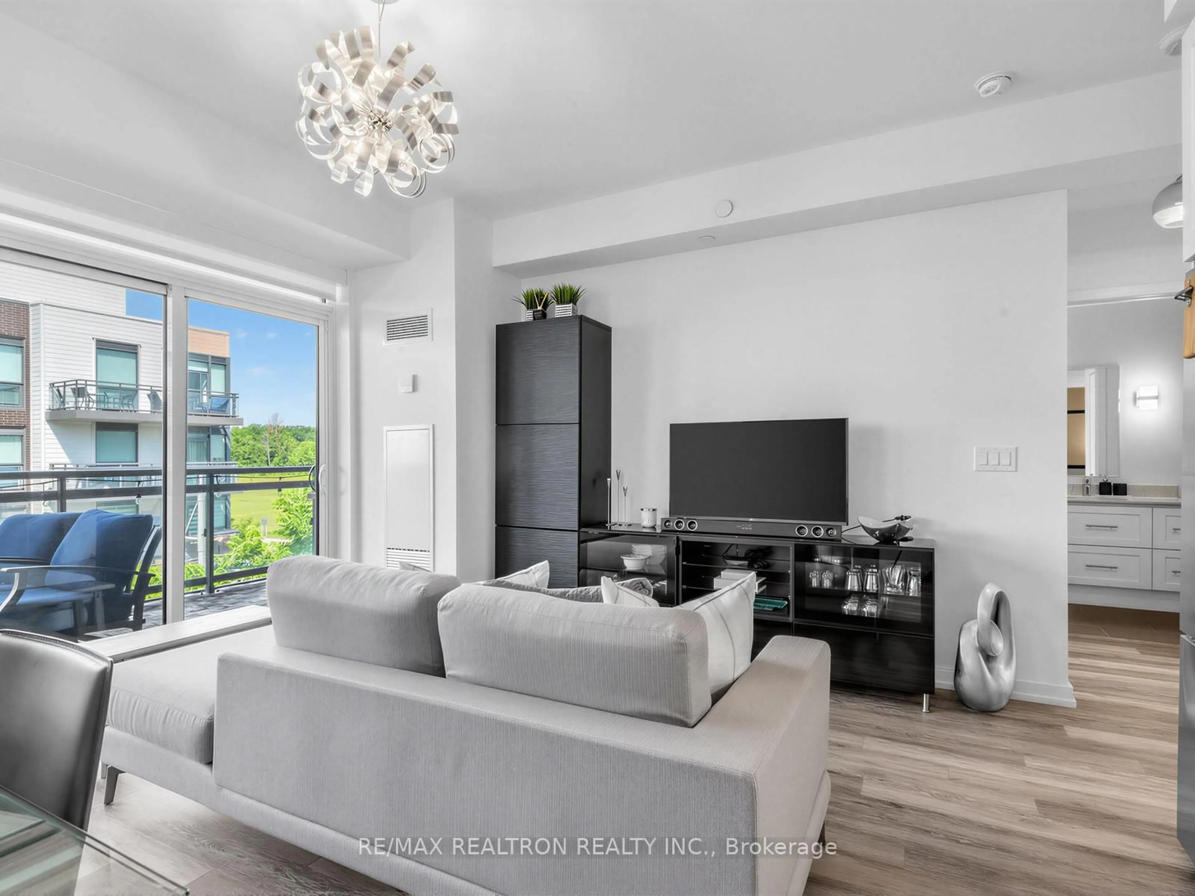 Living room with furniture, unknown for 241 Sea Ray Ave #A311, Innisfil Ontario L9S 0L9