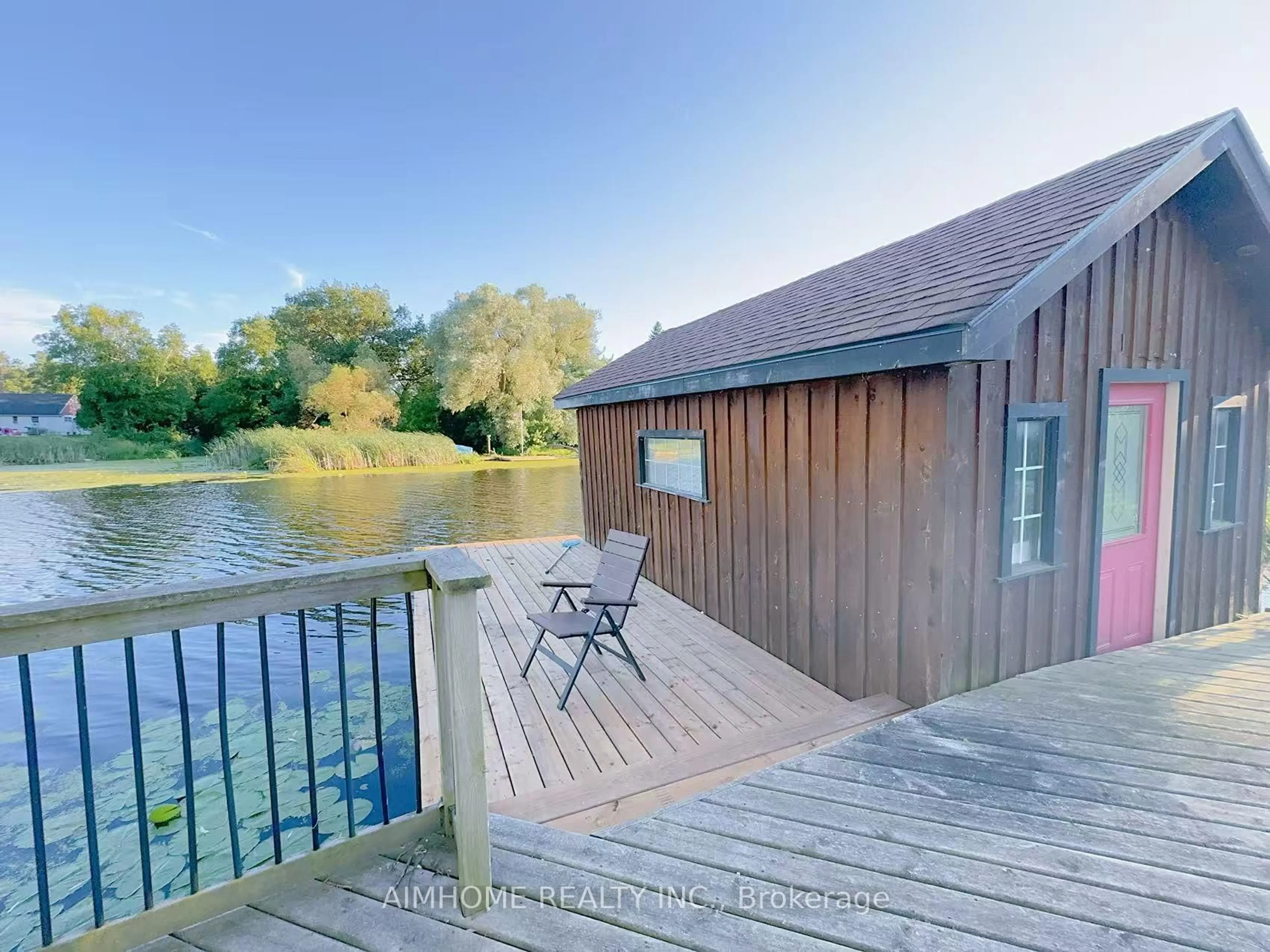A pic from outside/outdoor area/front of a property/back of a property/a pic from drone, water/lake/river/ocean view for 151 Riveredge Dr, Georgina Ontario L4P 2P4