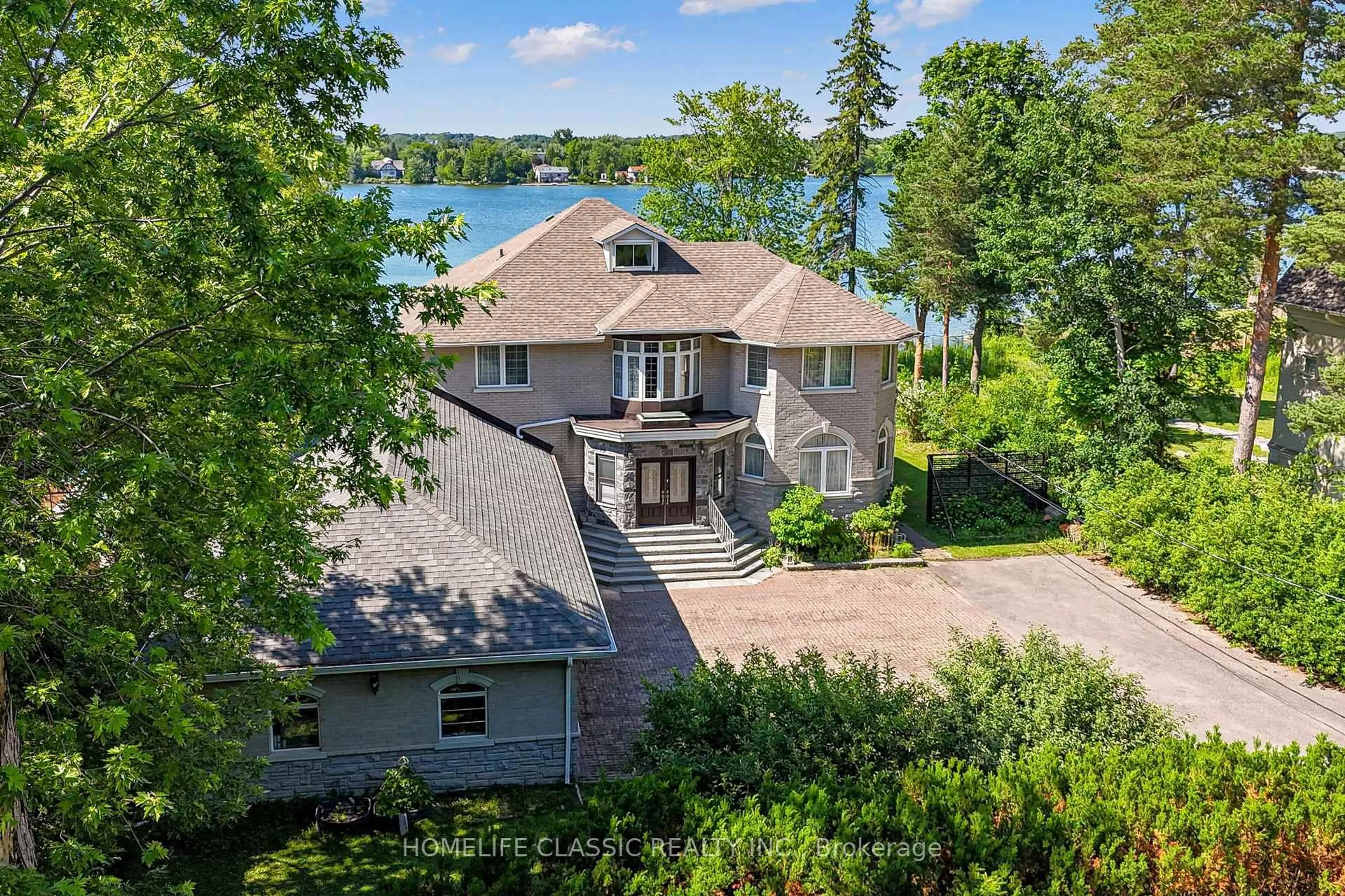 A pic from outside/outdoor area/front of a property/back of a property/a pic from drone, water/lake/river/ocean view for 472 Sunset Beach Rd, Richmond Hill Ontario L4E 3J2
