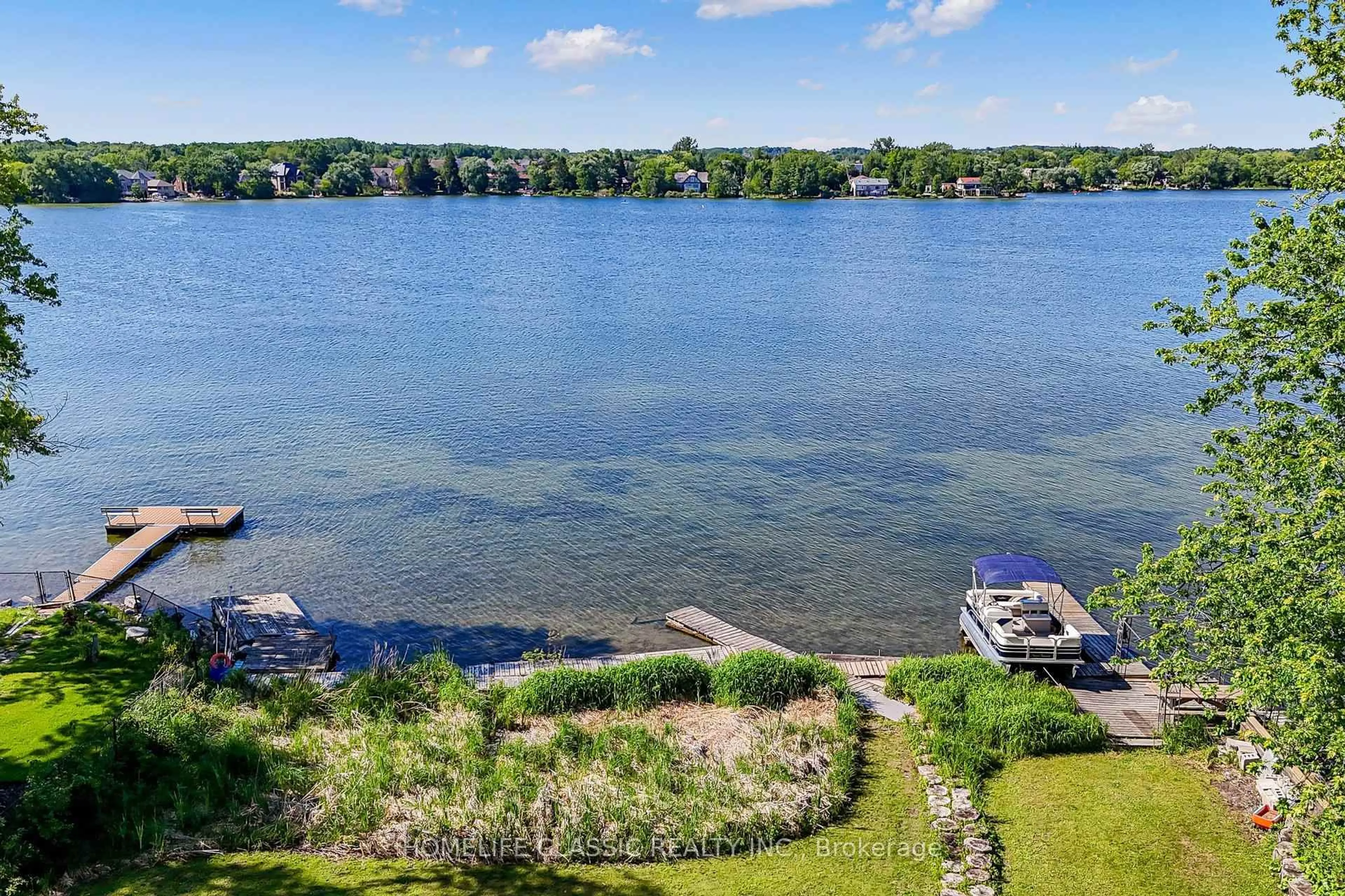 A pic from outside/outdoor area/front of a property/back of a property/a pic from drone, water/lake/river/ocean view for 472 Sunset Beach Rd, Richmond Hill Ontario L4E 3J2