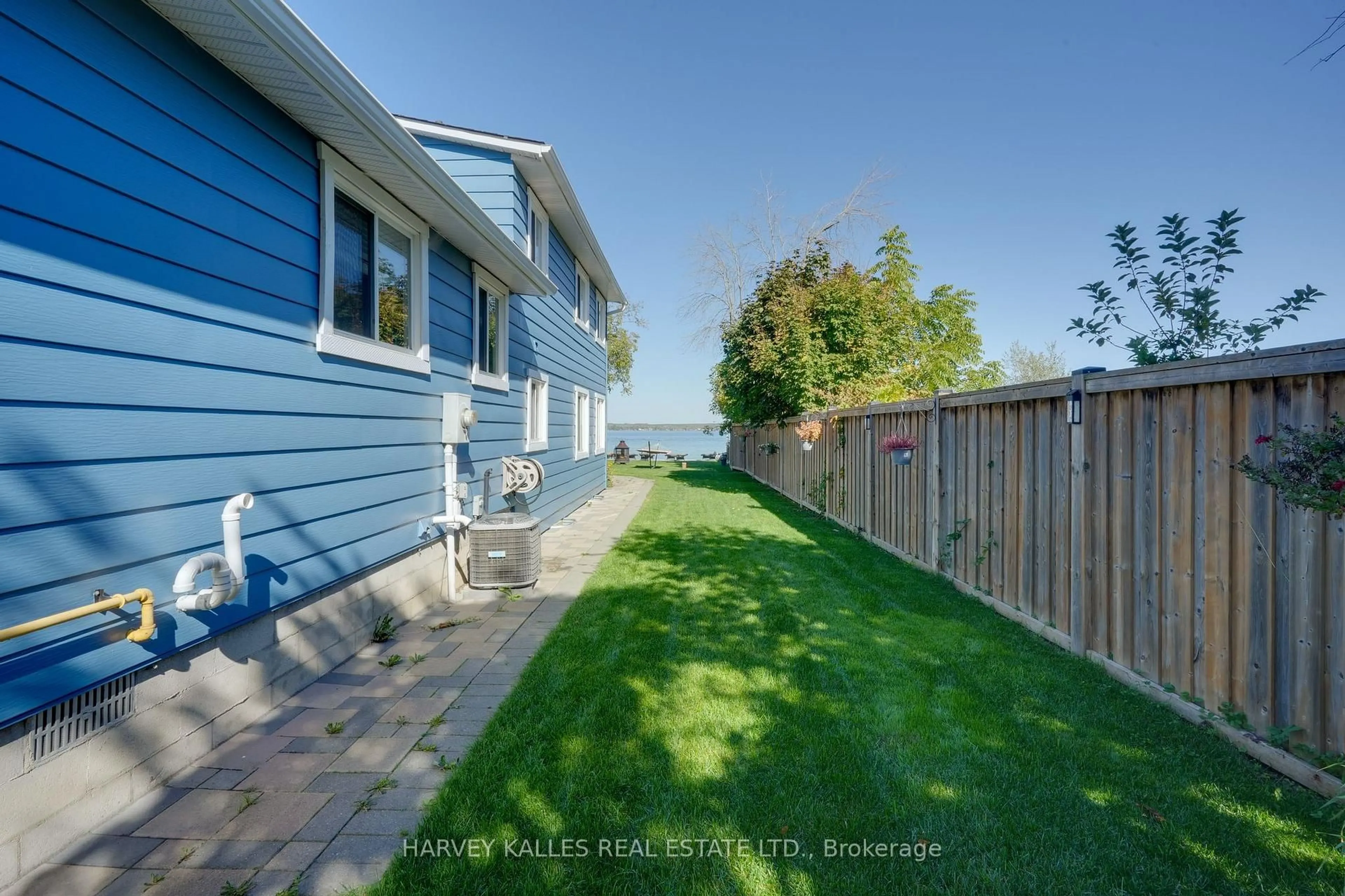 A pic from outside/outdoor area/front of a property/back of a property/a pic from drone, water/lake/river/ocean view for 72 Lakeside Dr, Innisfil Ontario L9S 2V3