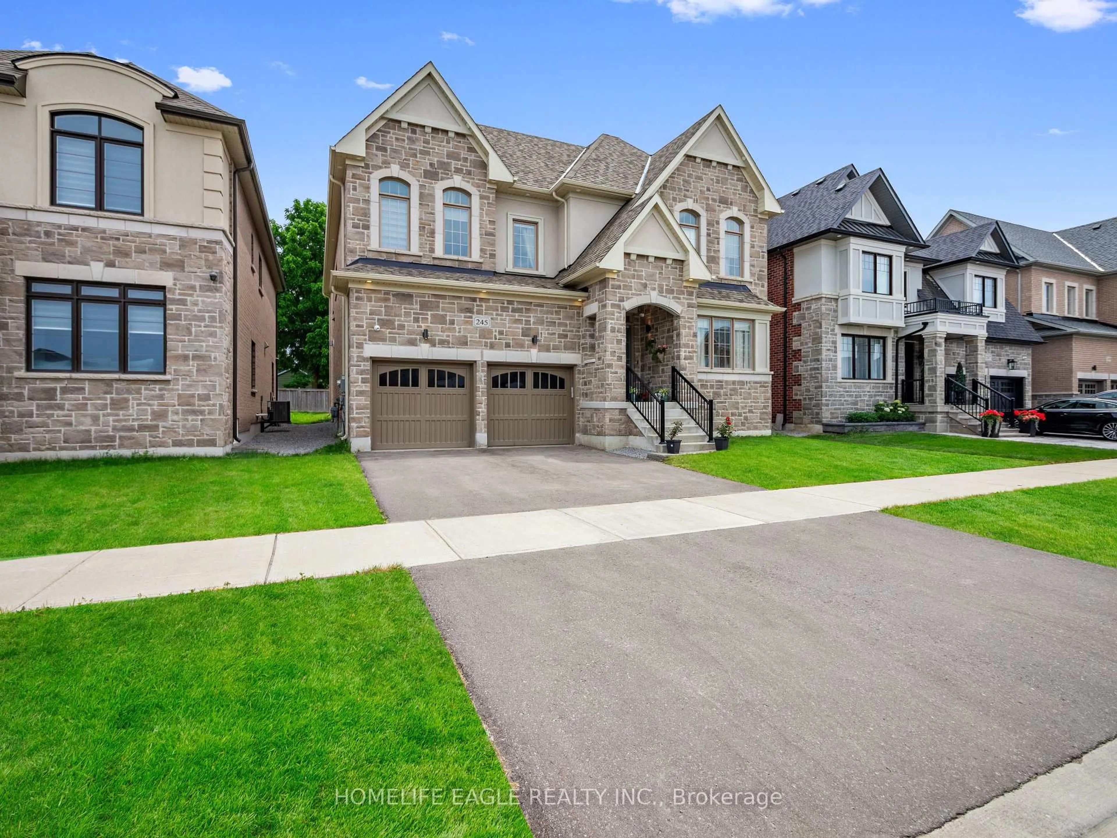 Home with brick exterior material, street for 245 Danny Wheeler Blvd, Georgina Ontario L4P 0J8