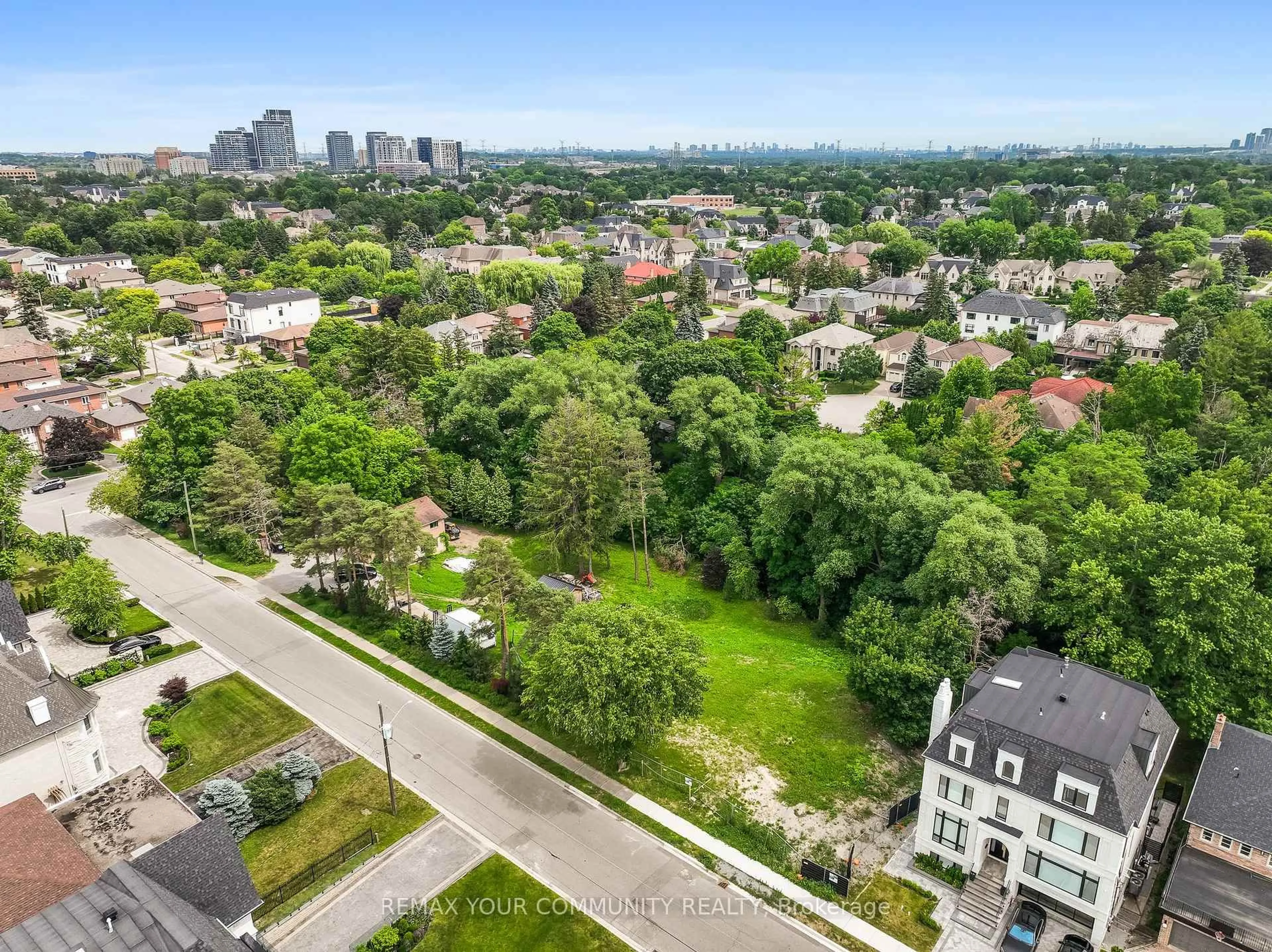 A pic from outside/outdoor area/front of a property/back of a property/a pic from drone, city buildings view from balcony for 7 Birch Ave, Richmond Hill Ontario L4C 6C4