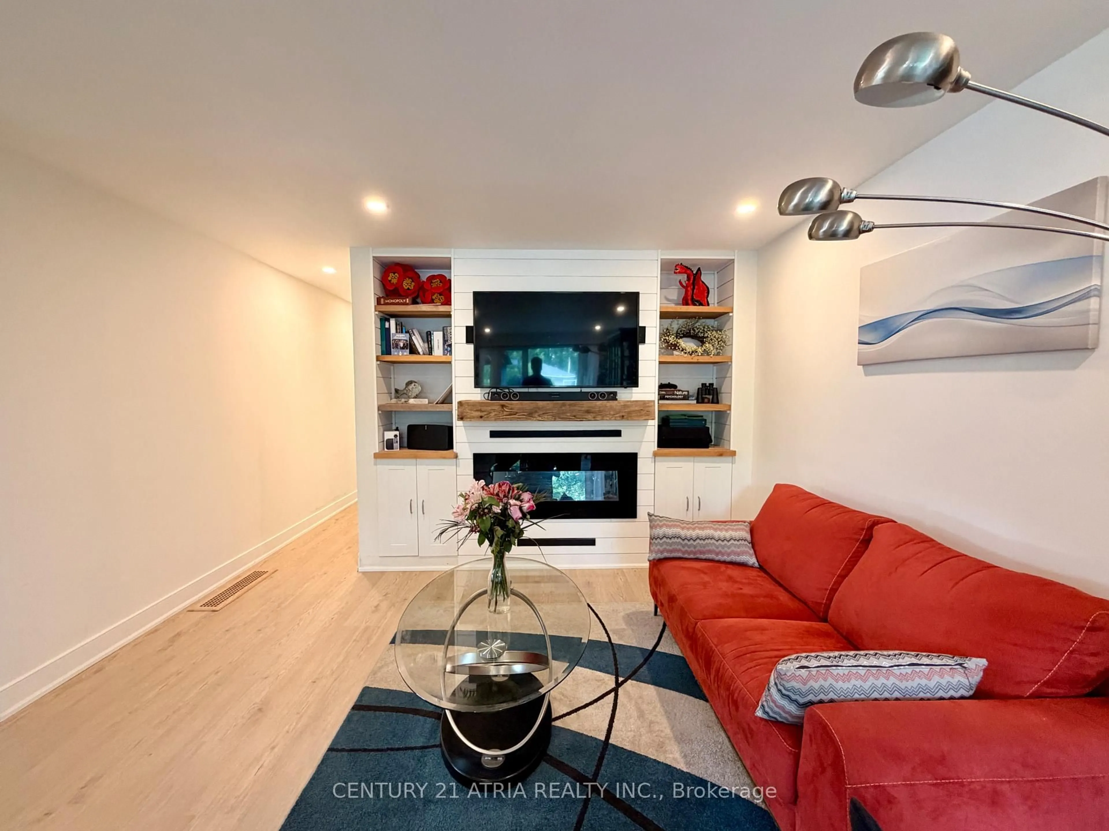 Living room with furniture, wood/laminate floor for 301 Axminster Dr, Richmond Hill Ontario L4C 2W3