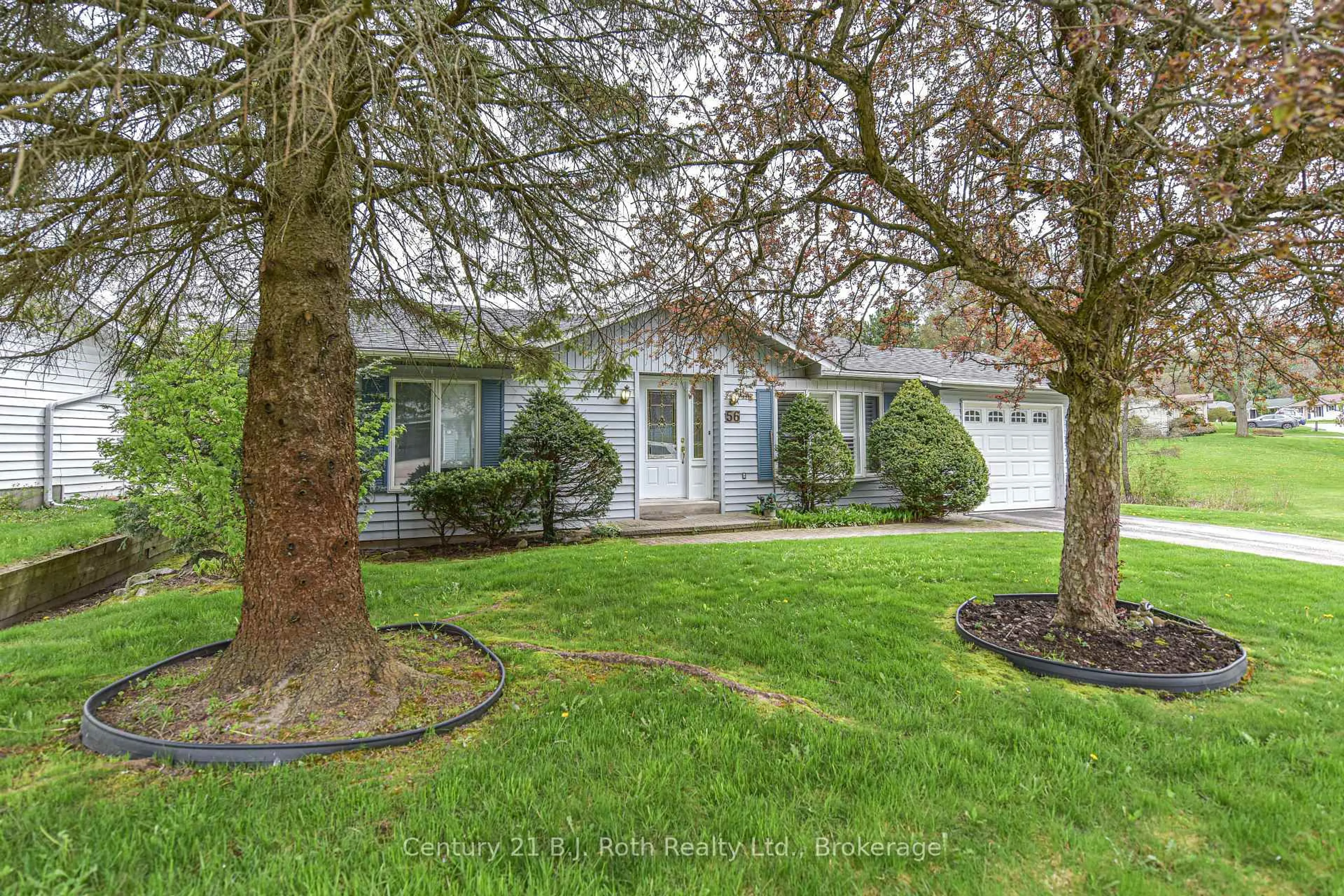 Home with vinyl exterior material, street for 56 TECUMSETH PINES Dr, New Tecumseth Ontario L0G 1W0