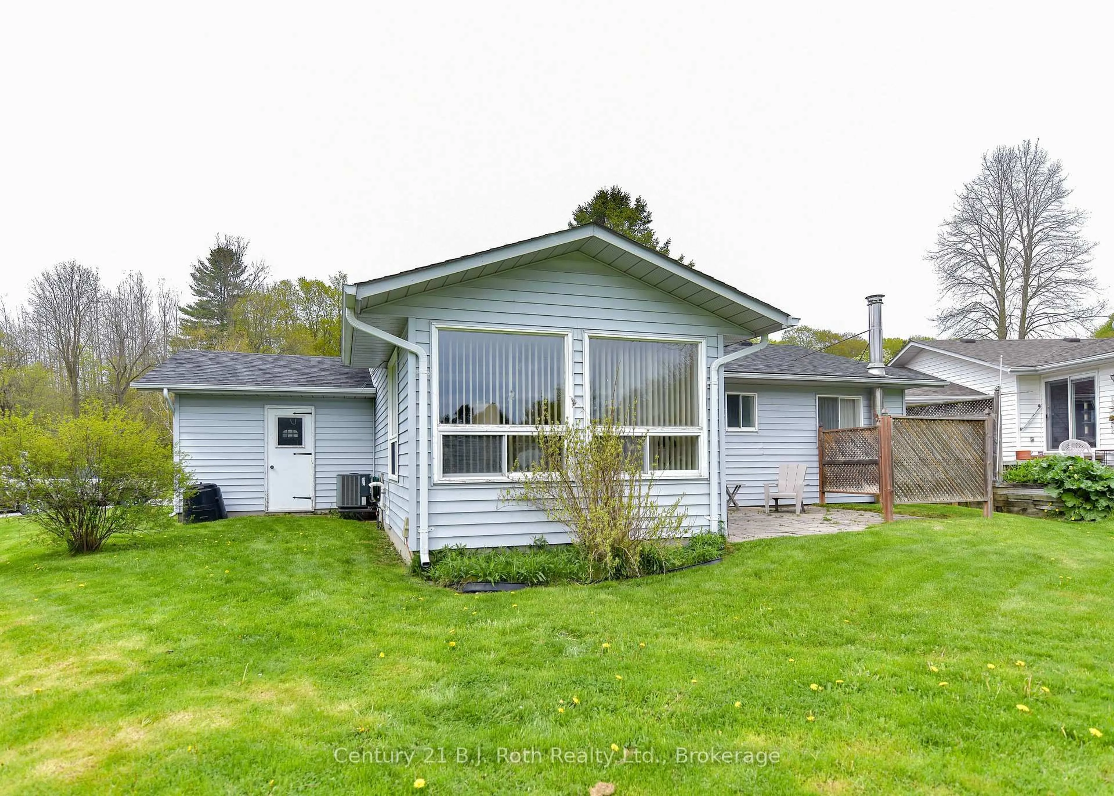 Home with vinyl exterior material, street for 56 TECUMSETH PINES Dr, New Tecumseth Ontario L0G 1W0