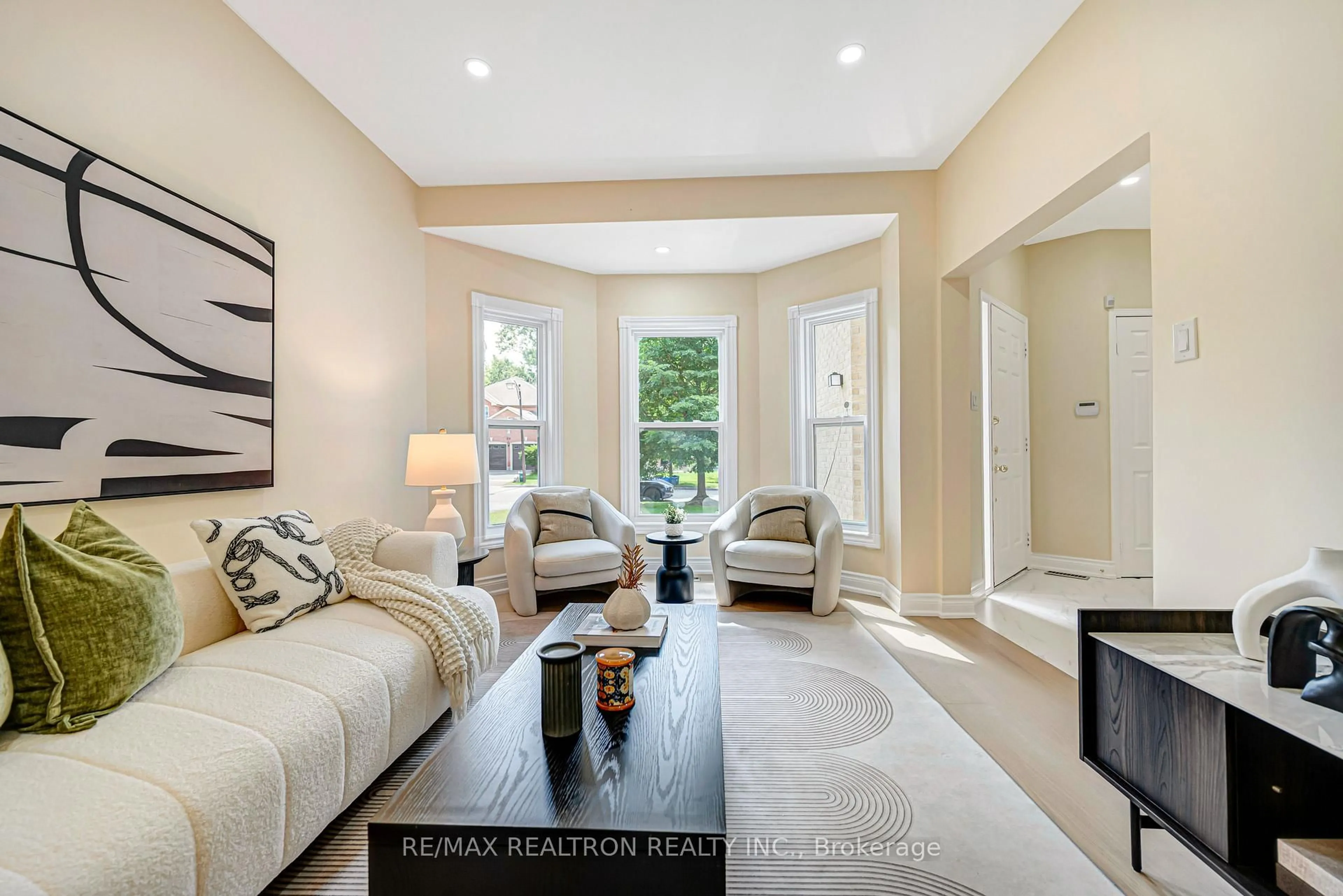 Living room with furniture, ceramic/tile floor for 27 Captain Francis Dr, Markham Ontario L3R 9C8