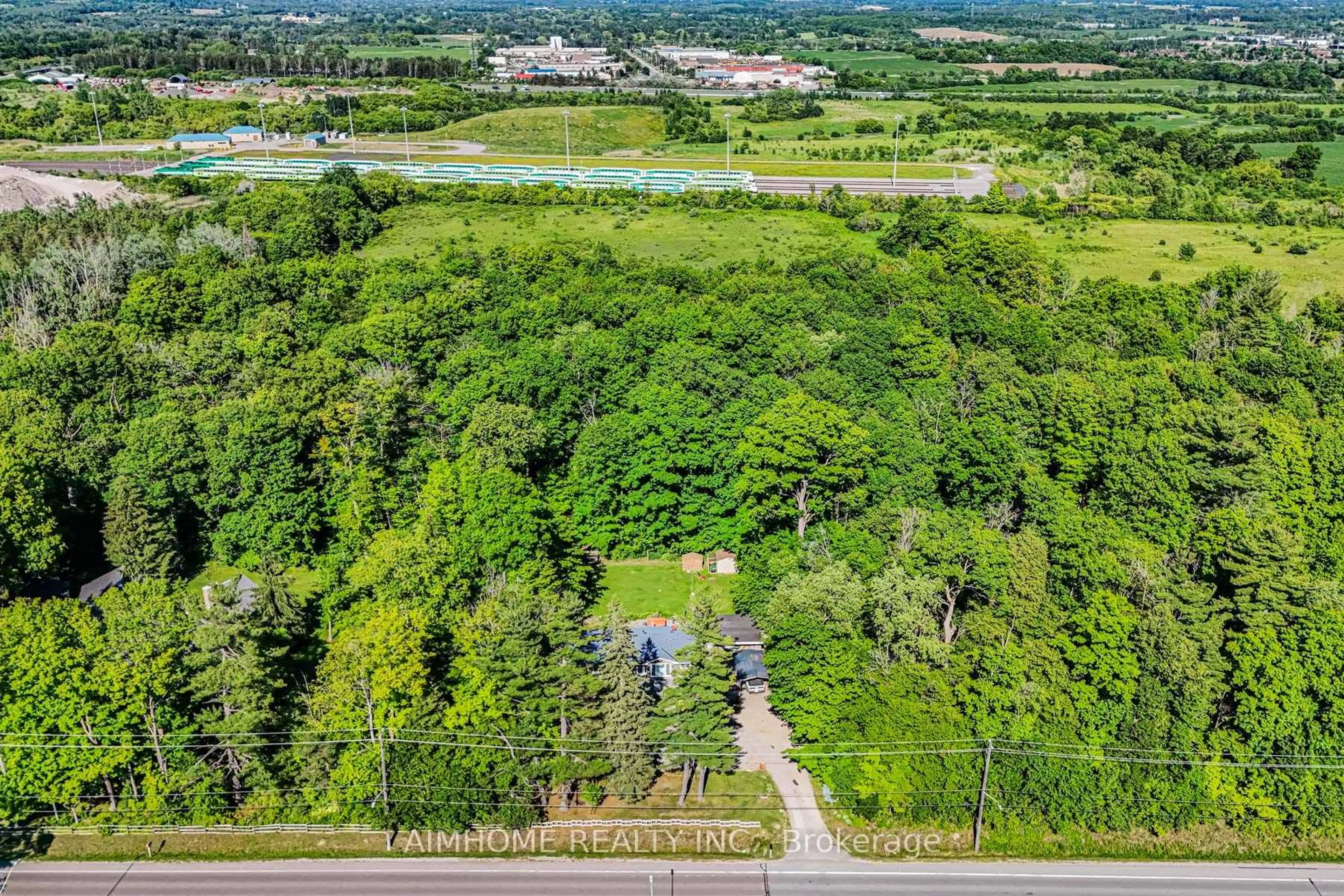 A pic from outside/outdoor area/front of a property/back of a property/a pic from drone, forest/trees view for 12827 Leslie St, Richmond Hill Ontario L4E 1A2